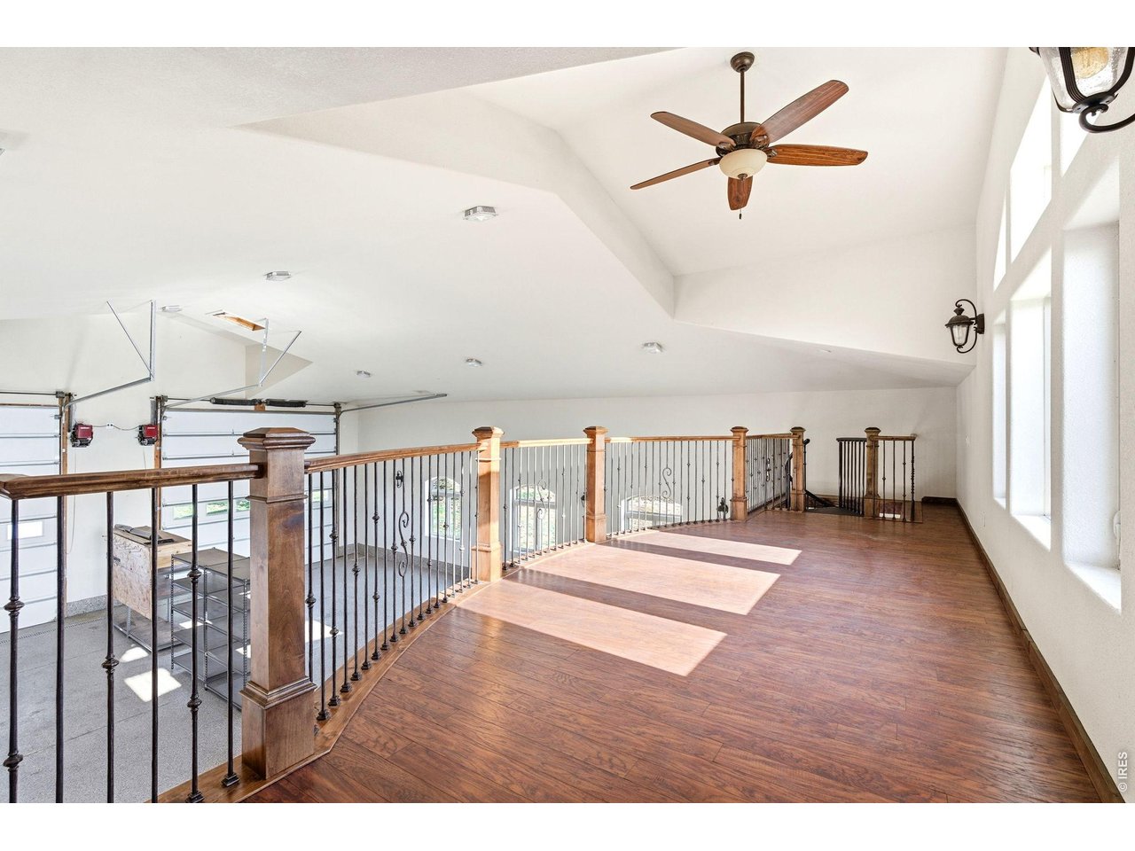 2153 Mountain River Road Berthoud, CO 80513 - Photo 44 of 50 Spiral staircase leads you upstairs
