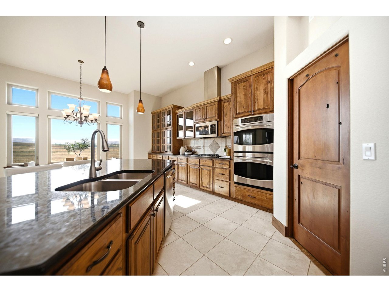 2153 Mountain River Road Berthoud, CO 80513 - Photo 10 of 50 Featuring sleek granite countertops