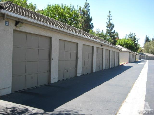 1043 Waltham Road, Unit C Simi Valley, CA 93065 - Photo 22 of 26 a side view of a house with a wooden deck