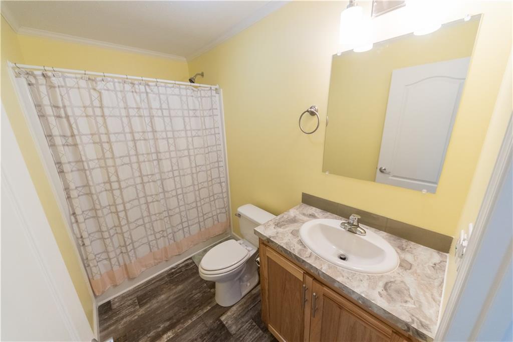 910 Jefferson Road Waynesburg, PA 15370 - Photo 11 of 17 a bathroom with a sink toilet and shower