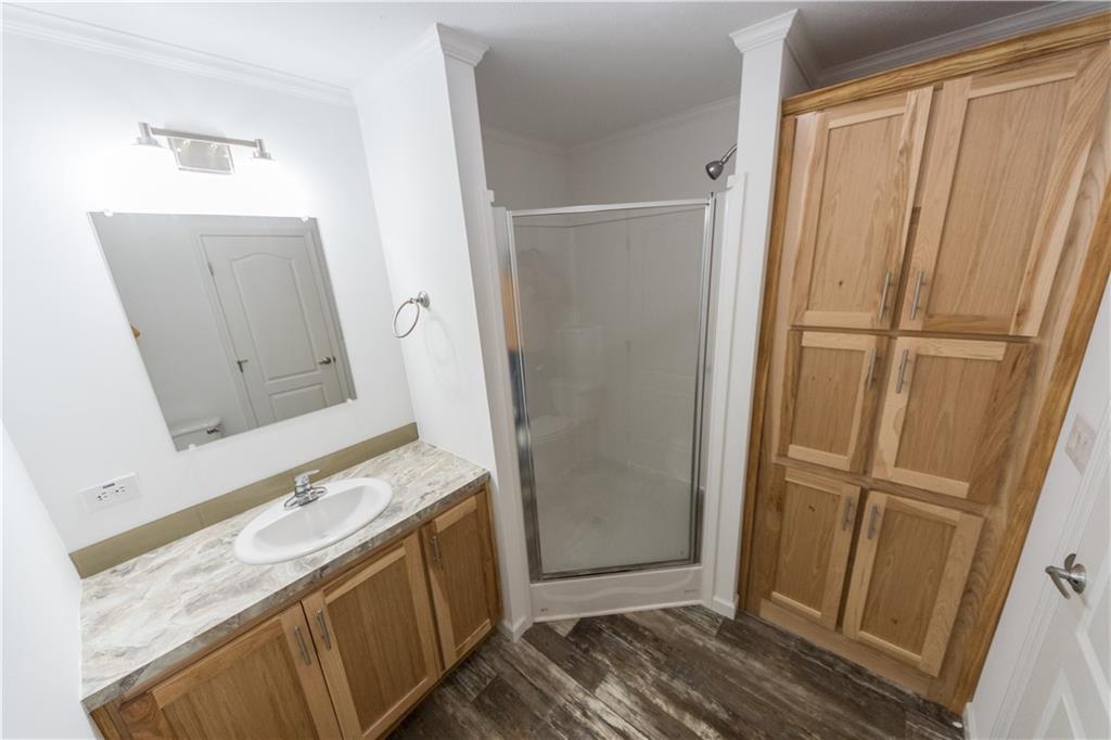 910 Jefferson Road Waynesburg, PA 15370 - Photo 13 of 17 a view of bathroom with a sink and mirror