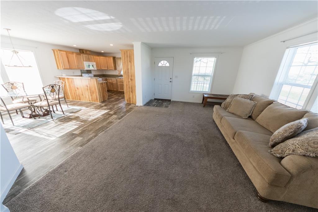 910 Jefferson Road Waynesburg, PA 15370 - Photo 4 of 17 a living room with furniture and a large window
