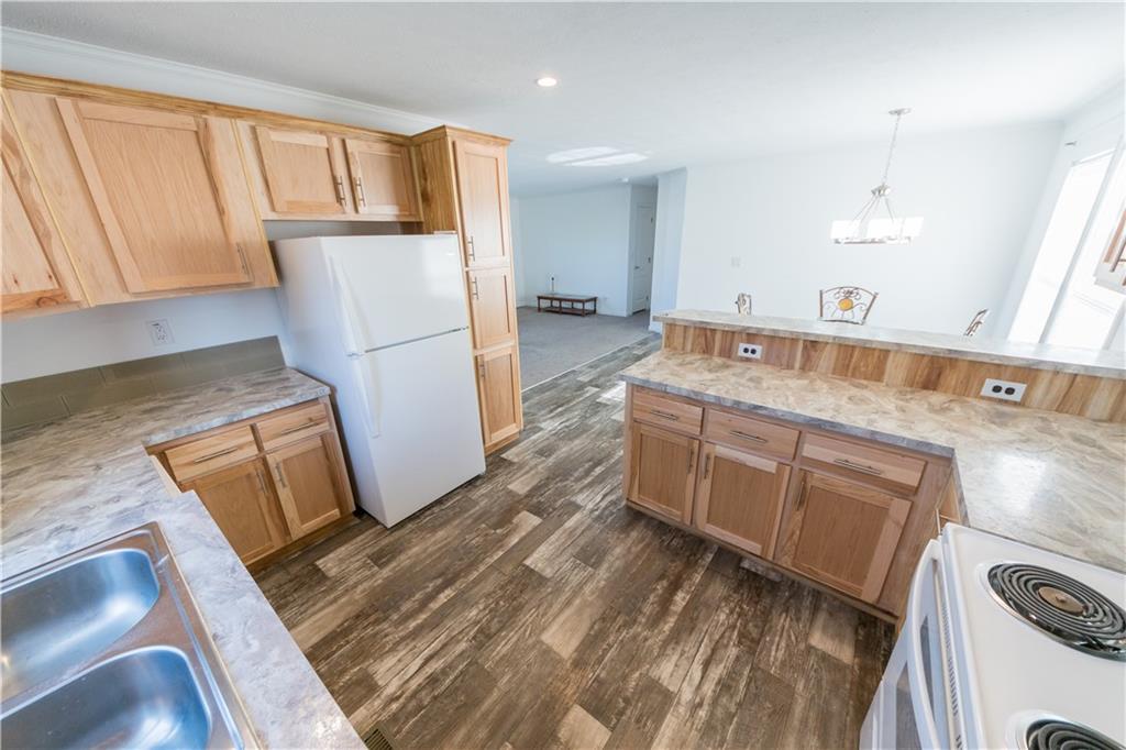 910 Jefferson Road Waynesburg, PA 15370 - Photo 7 of 17 a kitchen with a refrigerator sink and stove