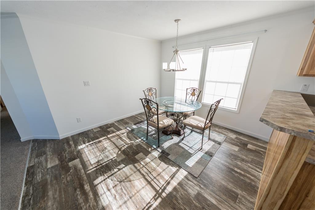 910 Jefferson Road Waynesburg, PA 15370 - Photo 8 of 17 a view of a dining room with furniture and a window