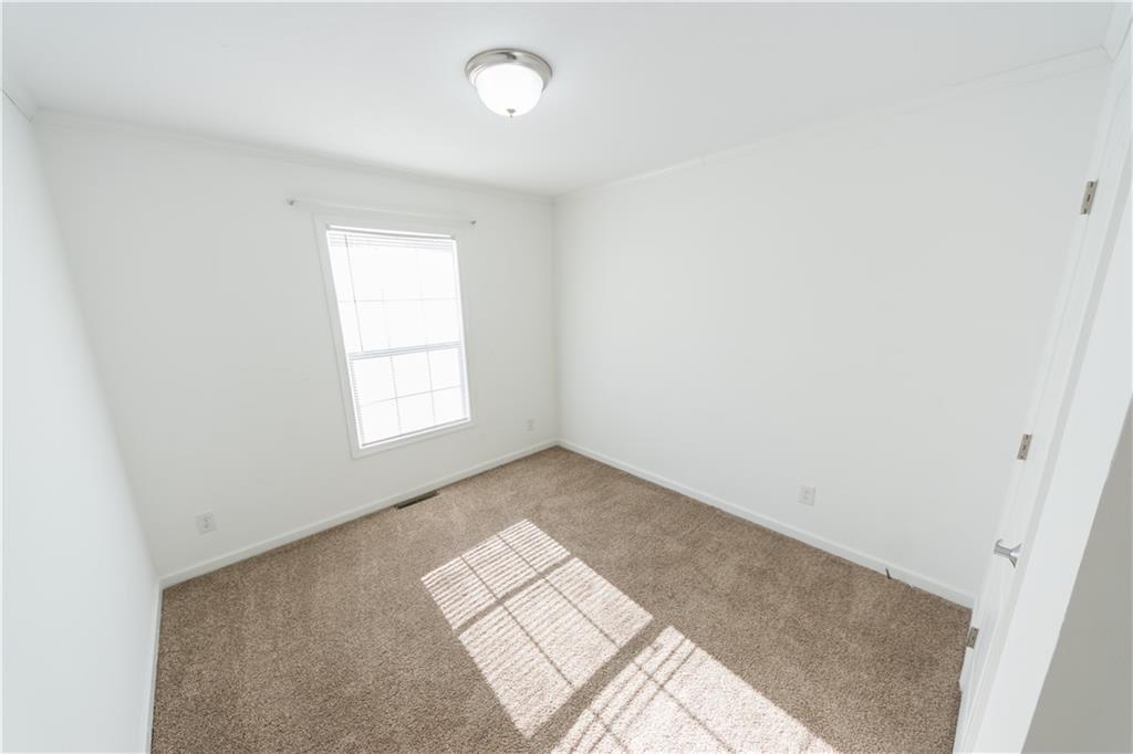 910 Jefferson Road Waynesburg, PA 15370 - Photo 9 of 17 an empty room with windows