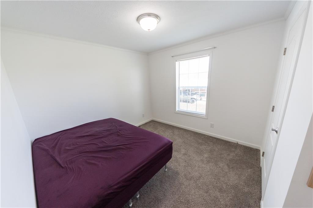 910 Jefferson Road Waynesburg, PA 15370 - Photo 10 of 17 a bedroom with a bed and a window