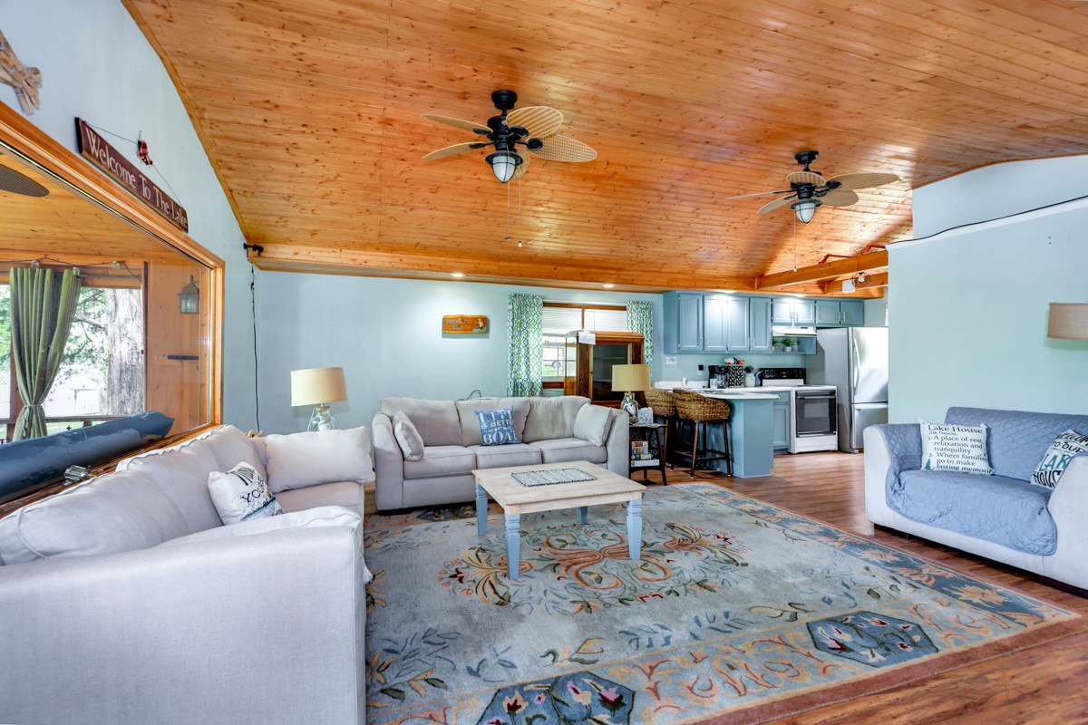 1227 Lake Logan Road Ardmore, TN 38449 - Photo 7 of 29 a living room with furniture and a chandelier