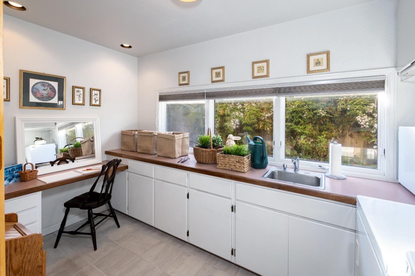 202 Seacliff Drive Aptos, CA 95003 - Photo 28 of 36 a room with granite countertop furniture and a large window