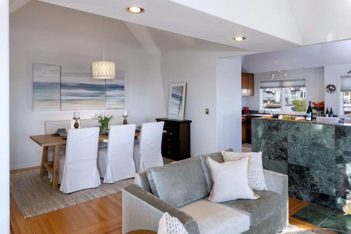 202 Seacliff Drive Aptos, CA 95003 - Photo 7 of 36 a living room with furniture and a fireplace