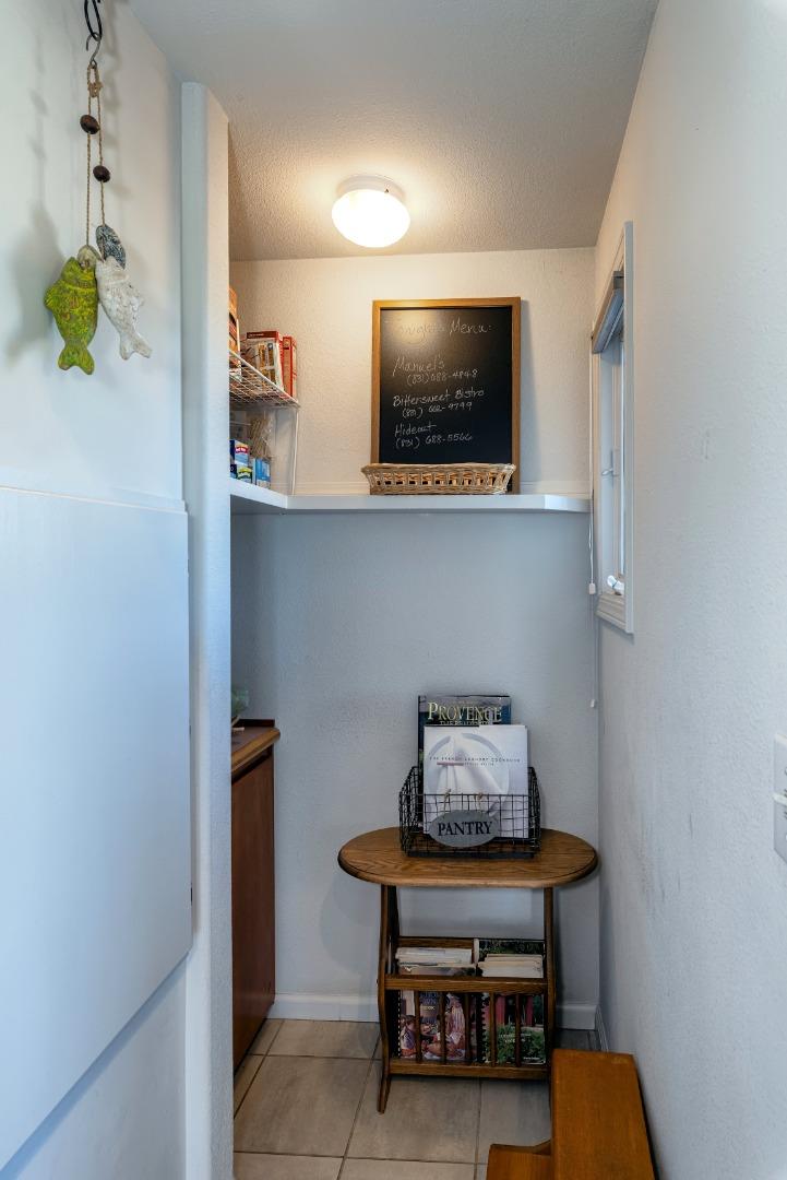 202 Seacliff Drive Aptos, CA 95003 - Photo 10 of 36 a living room with furniture and a flat screen tv