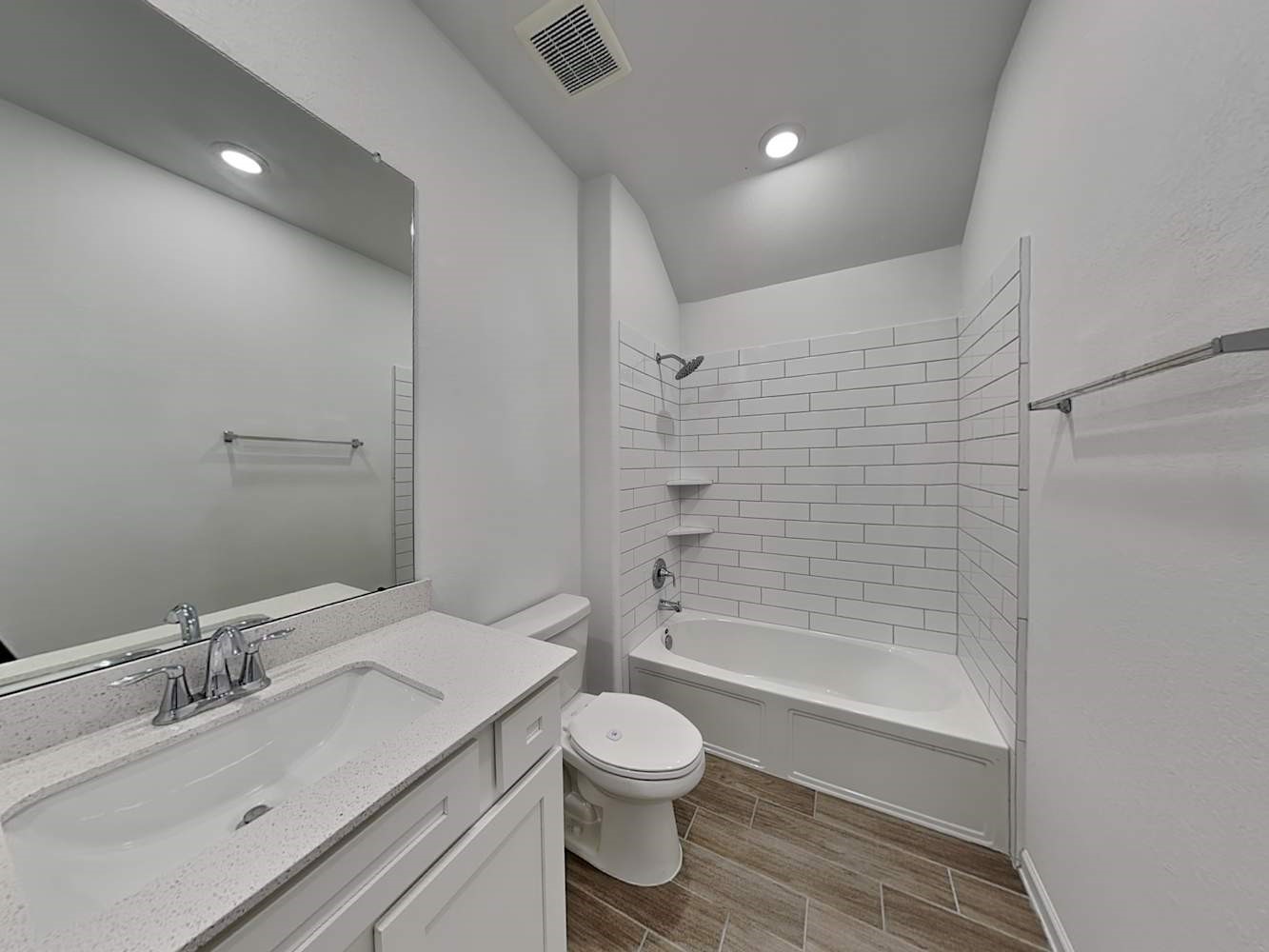 4023 Champlain Way Rosharon, TX 77583 - Photo 12 of 14 a bathroom with a granite countertop sink toilet a shower and a mirror