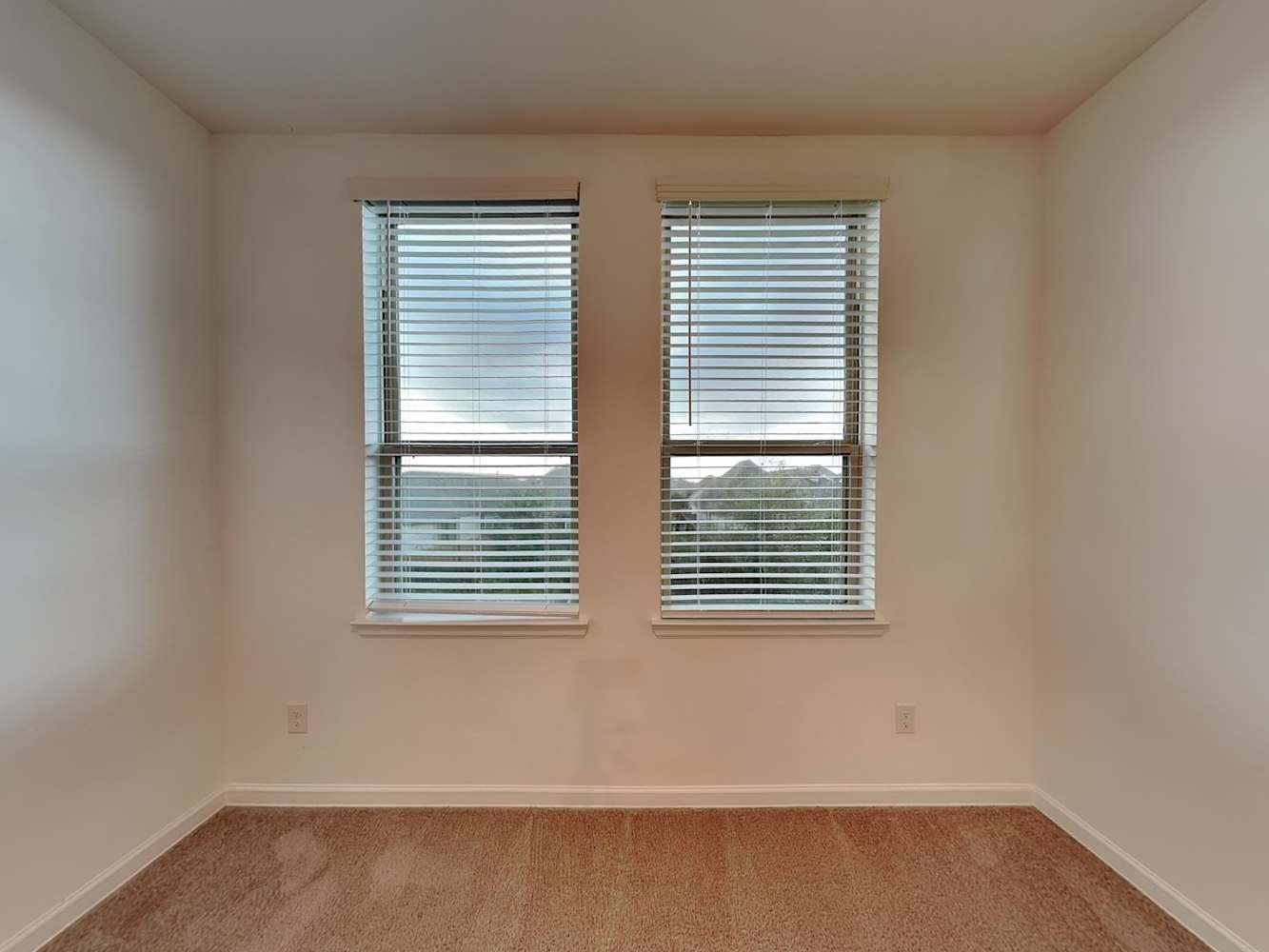 4023 Champlain Way Rosharon, TX 77583 - Photo 5 of 14 a view of an empty room with a window