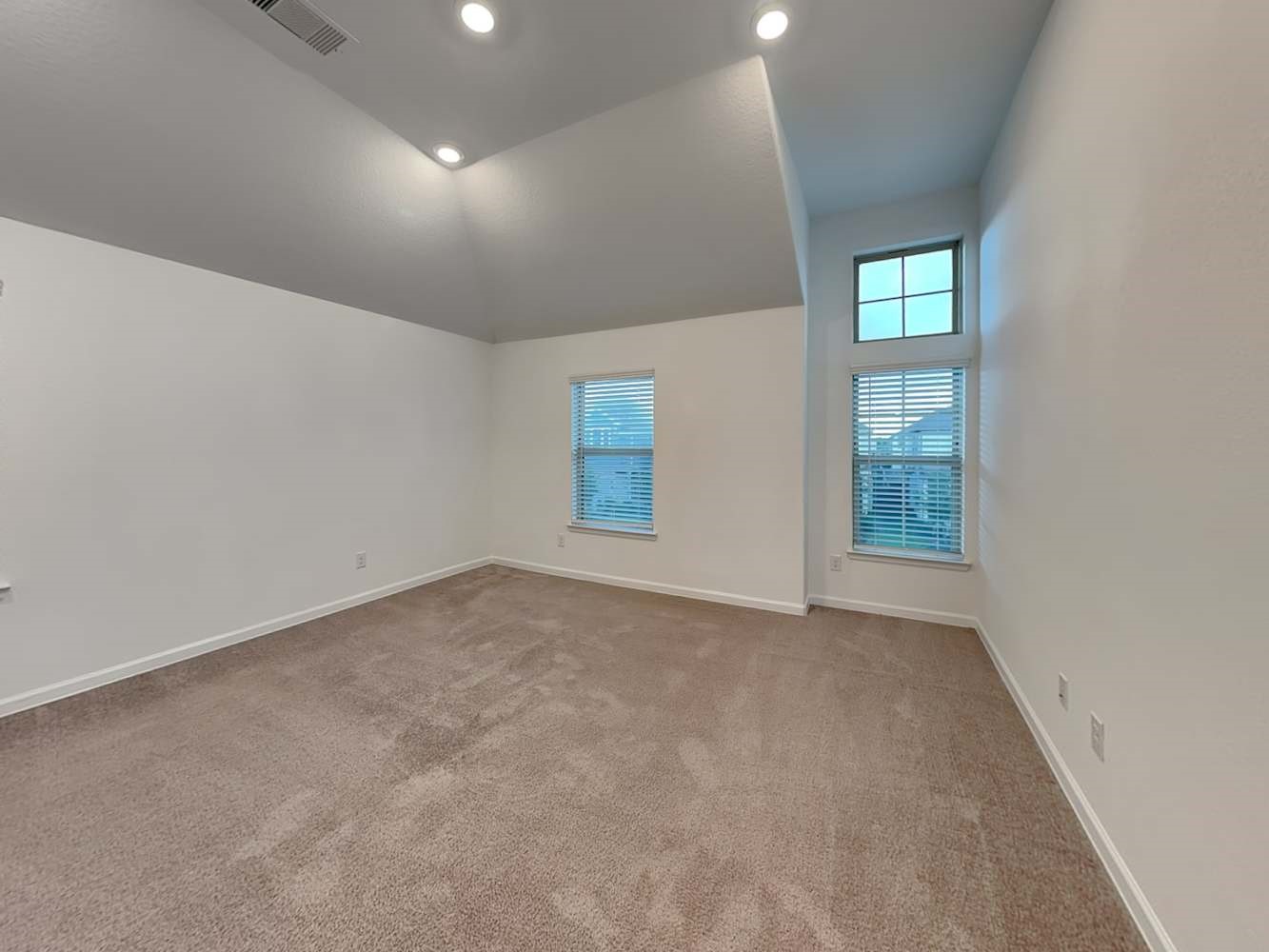 4023 Champlain Way Rosharon, TX 77583 - Photo 8 of 14 an empty room with windows