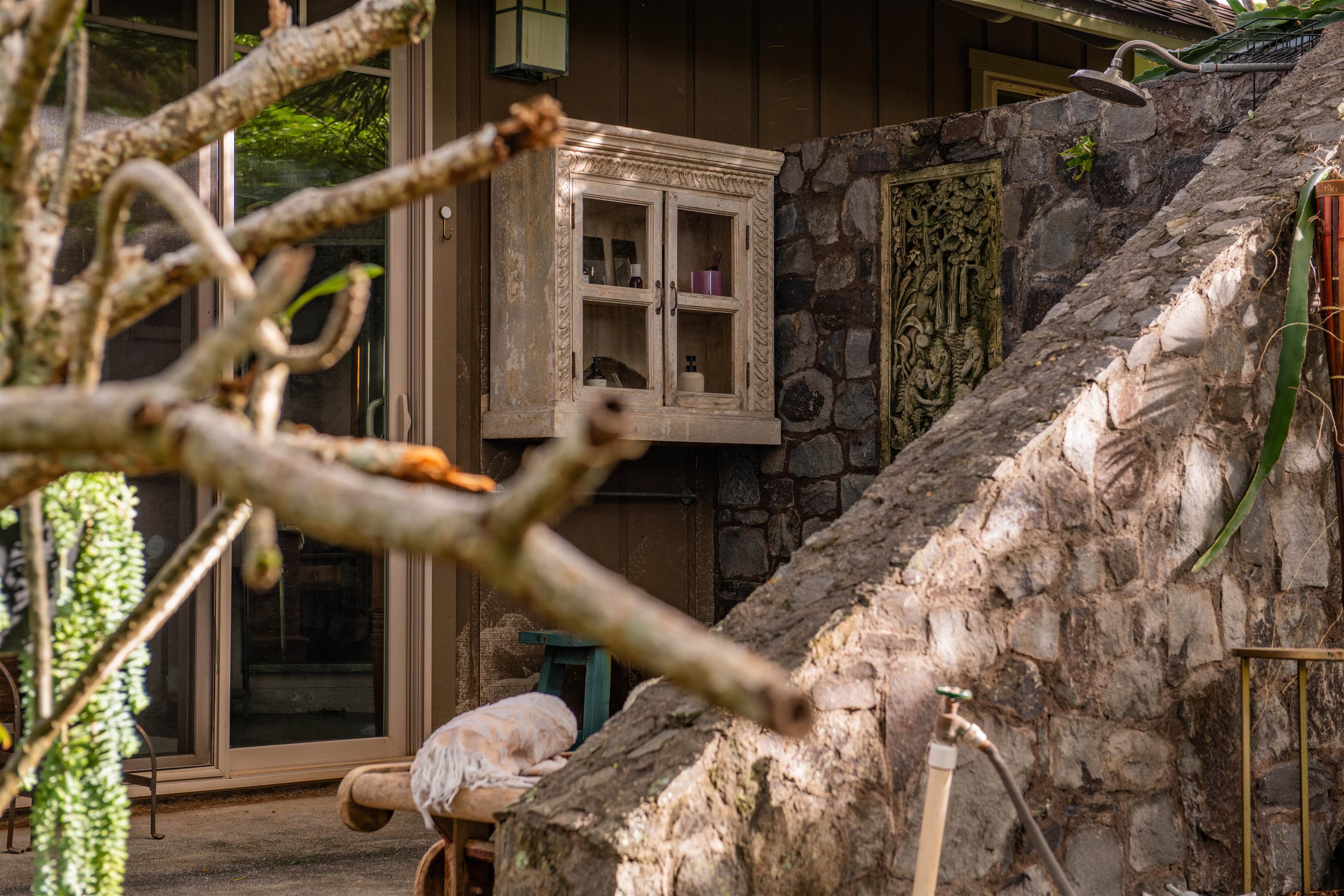 52 Papio Way, Unit A Haiku, HI 96708 - Photo 30 of 50 a front view of a house with a tree