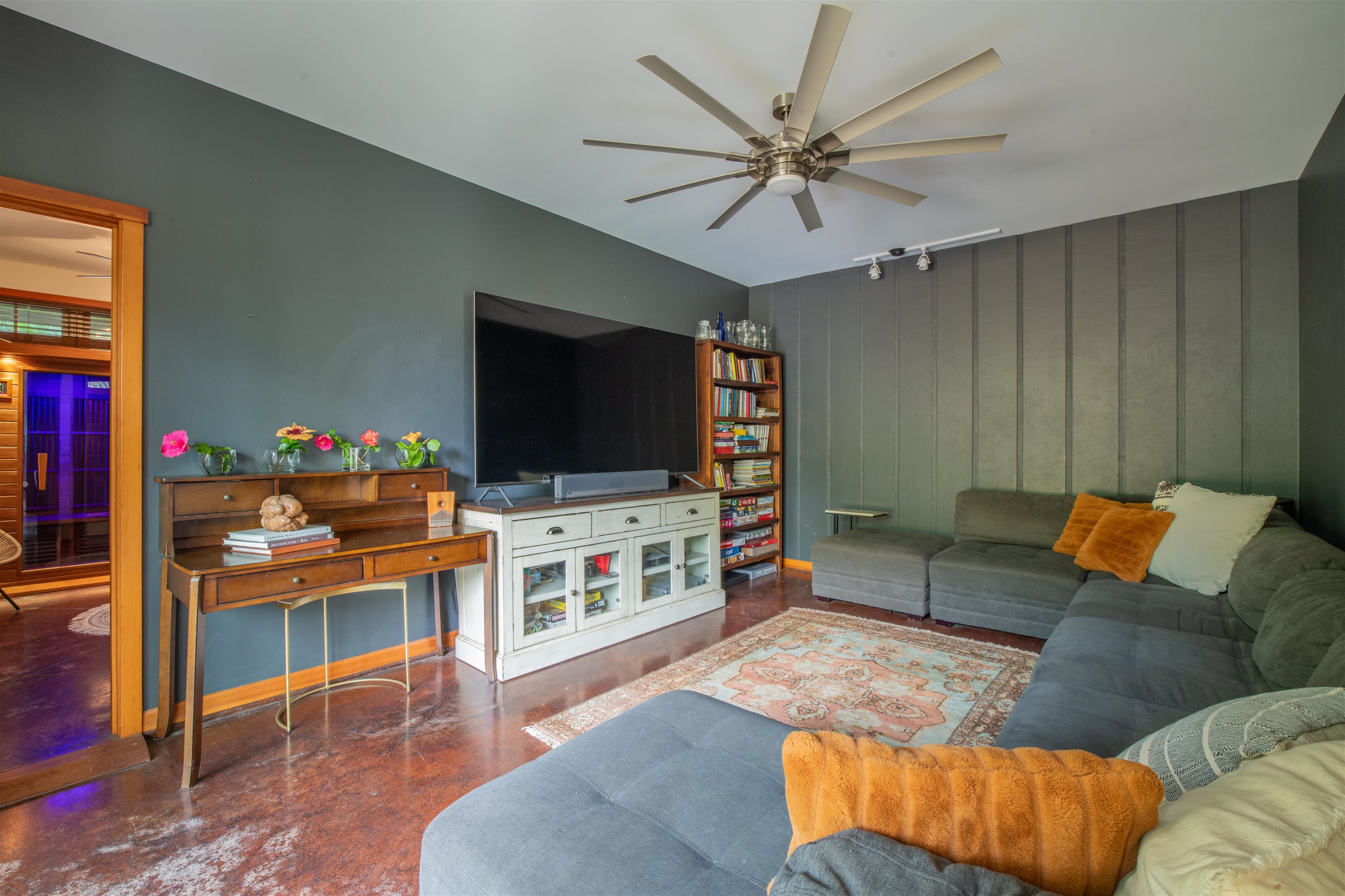 52 Papio Way, Unit A Haiku, HI 96708 - Photo 34 of 50 a living room with furniture and a flat screen tv