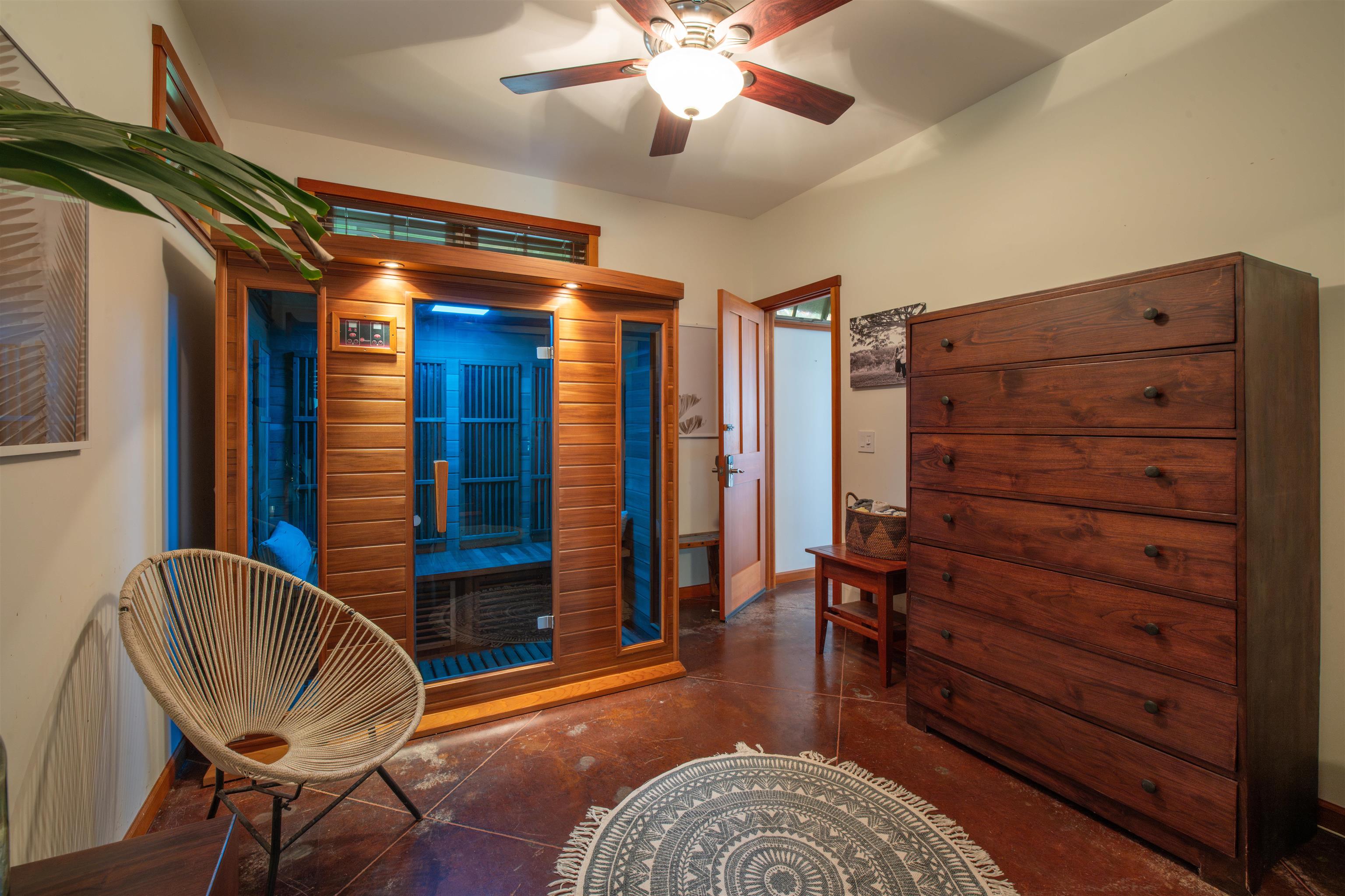 52 Papio Way, Unit A Haiku, HI 96708 - Photo 35 of 50 a view of a livingroom with furniture and staircase