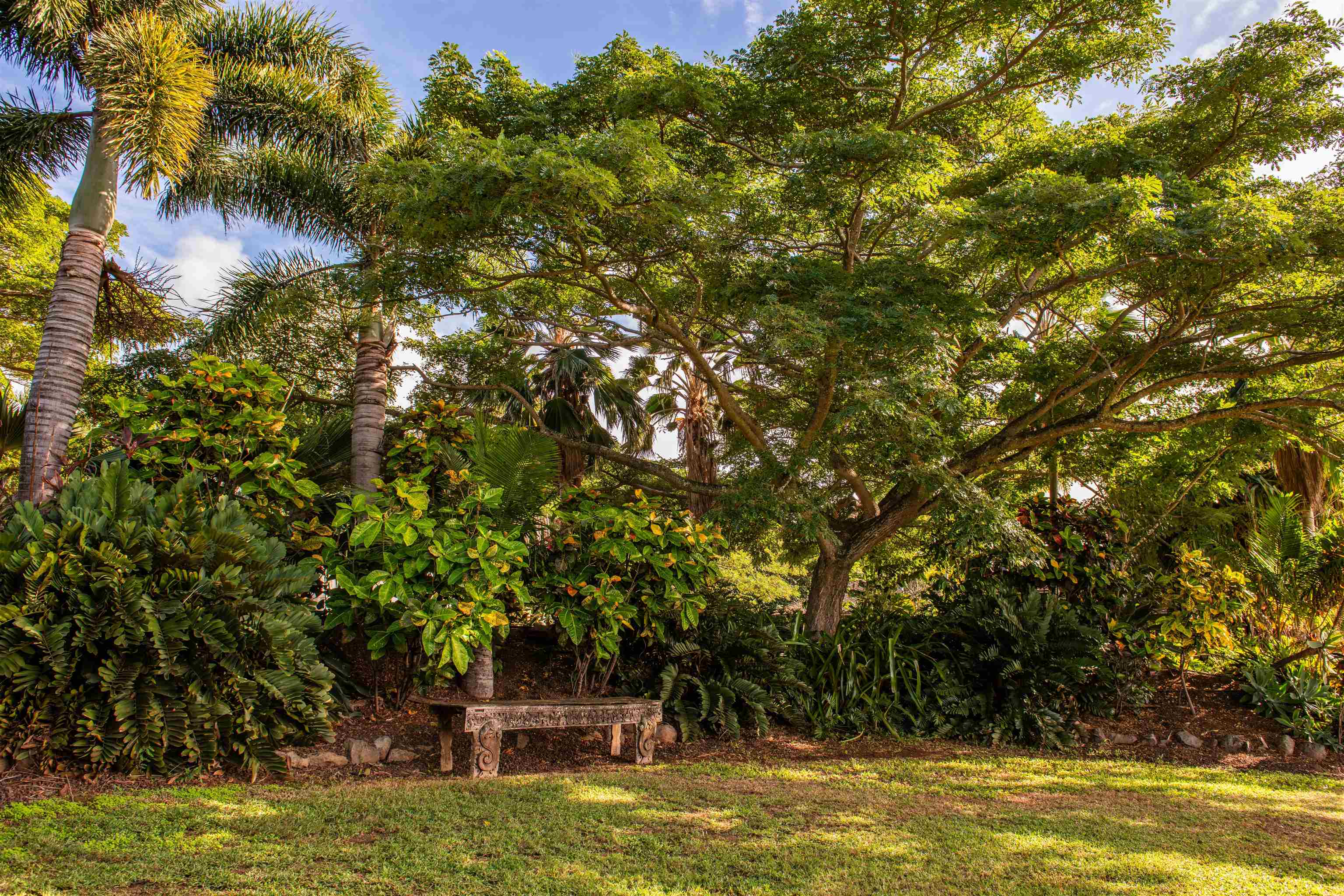 52 Papio Way, Unit A Haiku, HI 96708 - Photo 40 of 50 a view of swimming pool with seating space