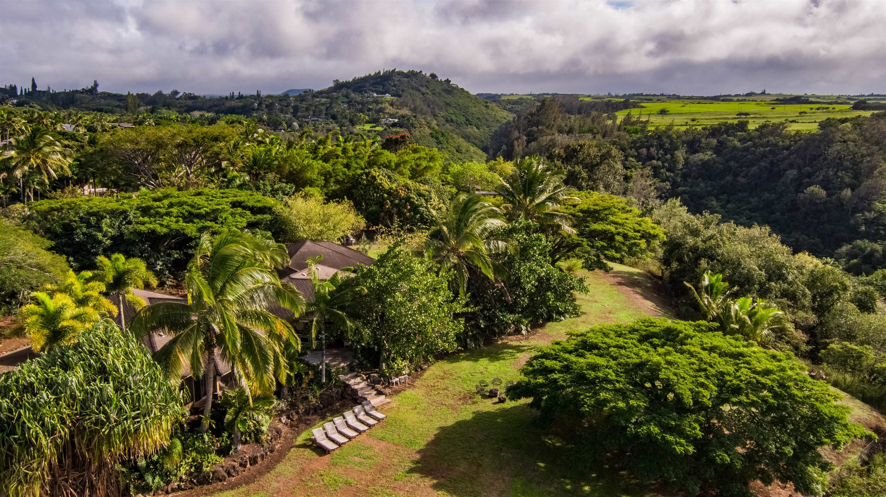 52 Papio Way, Unit A Haiku, HI 96708 - Photo 47 of 50 a view of a lake with a building in the background