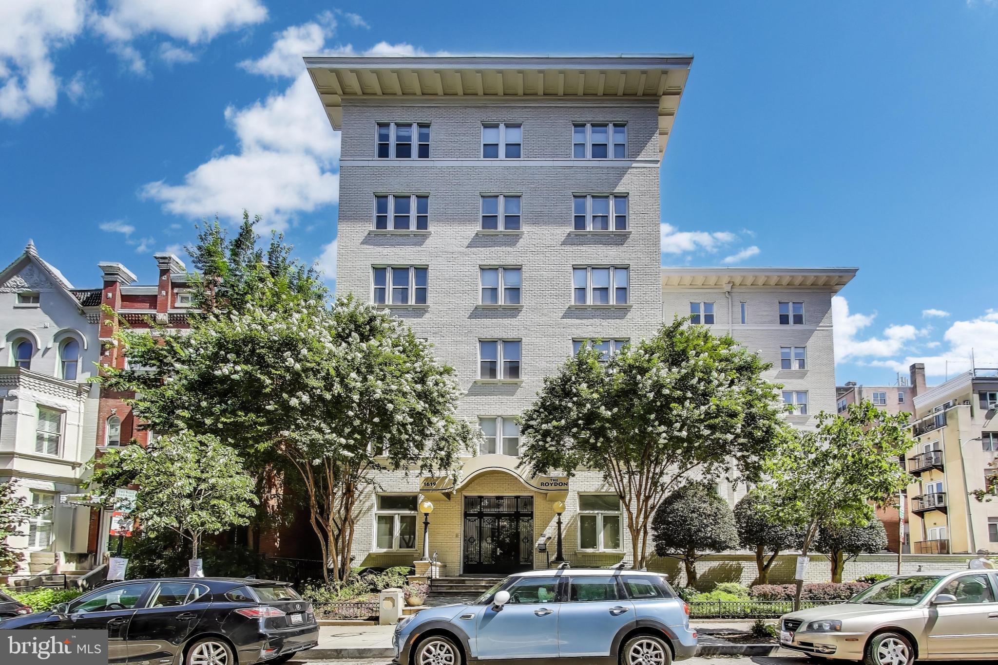 1619 R Street Northwest, Unit 501 Washington, DC 20009 - Photo 2 of 25 a view of a building and car parked