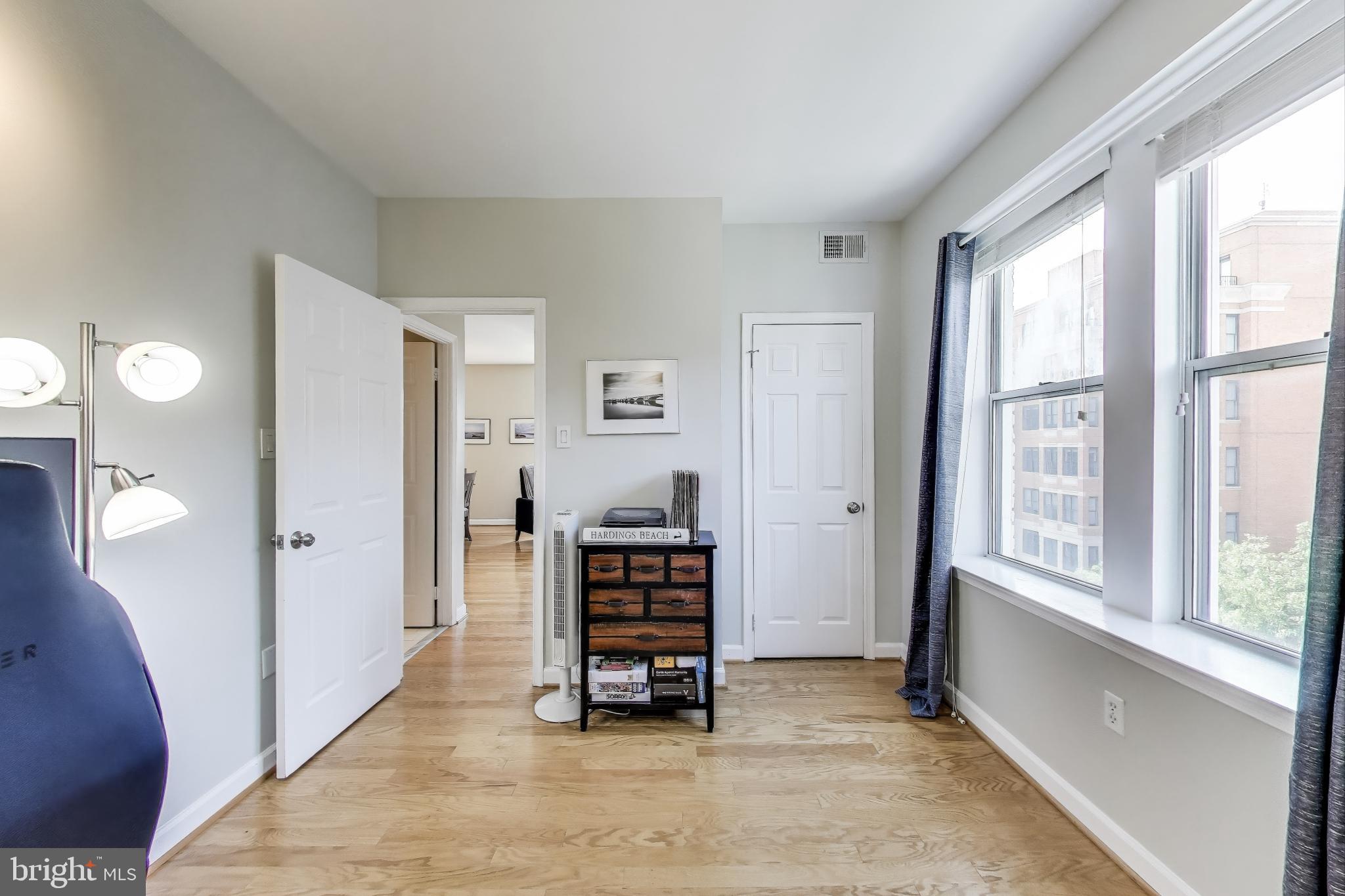 1619 R Street Northwest, Unit 501 Washington, DC 20009 - Photo 22 of 25 a view of room with window and cabinet