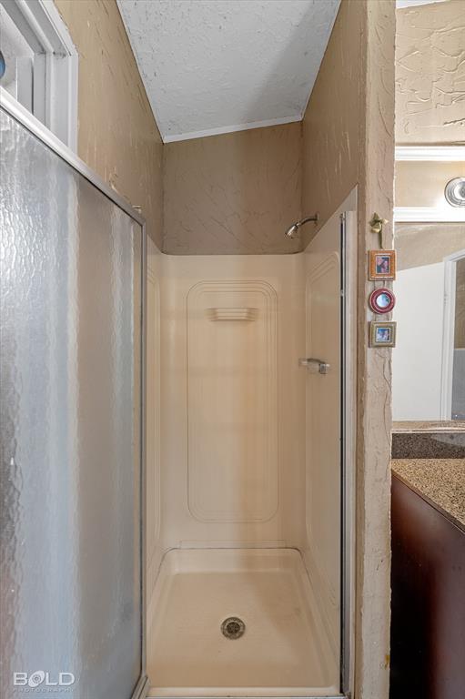 9720 Osburn Road Shreveport, LA 71129 - Photo 16 of 30 Enclosed shower stall with a single shower head and a built-in soap dish