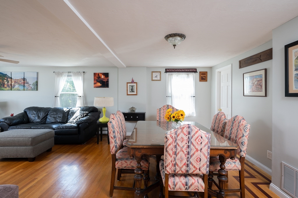 29 Wituwamat Road Weymouth, MA 02191 - Photo 17 of 42 a living room with furniture and wooden floor