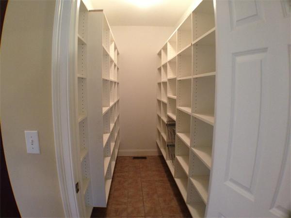 60 Tenney Road Westford, MA 01886 - Photo 8 of 27 a view of staircase with white walls and white door