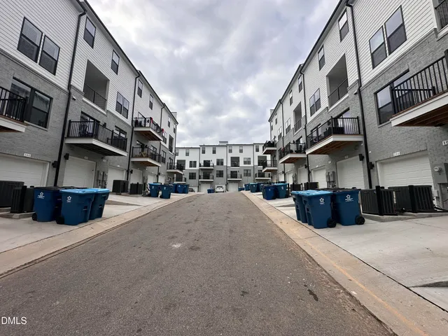 a view of street with large buildings