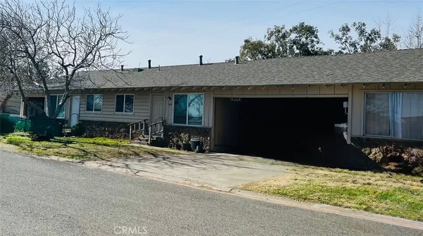 a house with trees in front of it