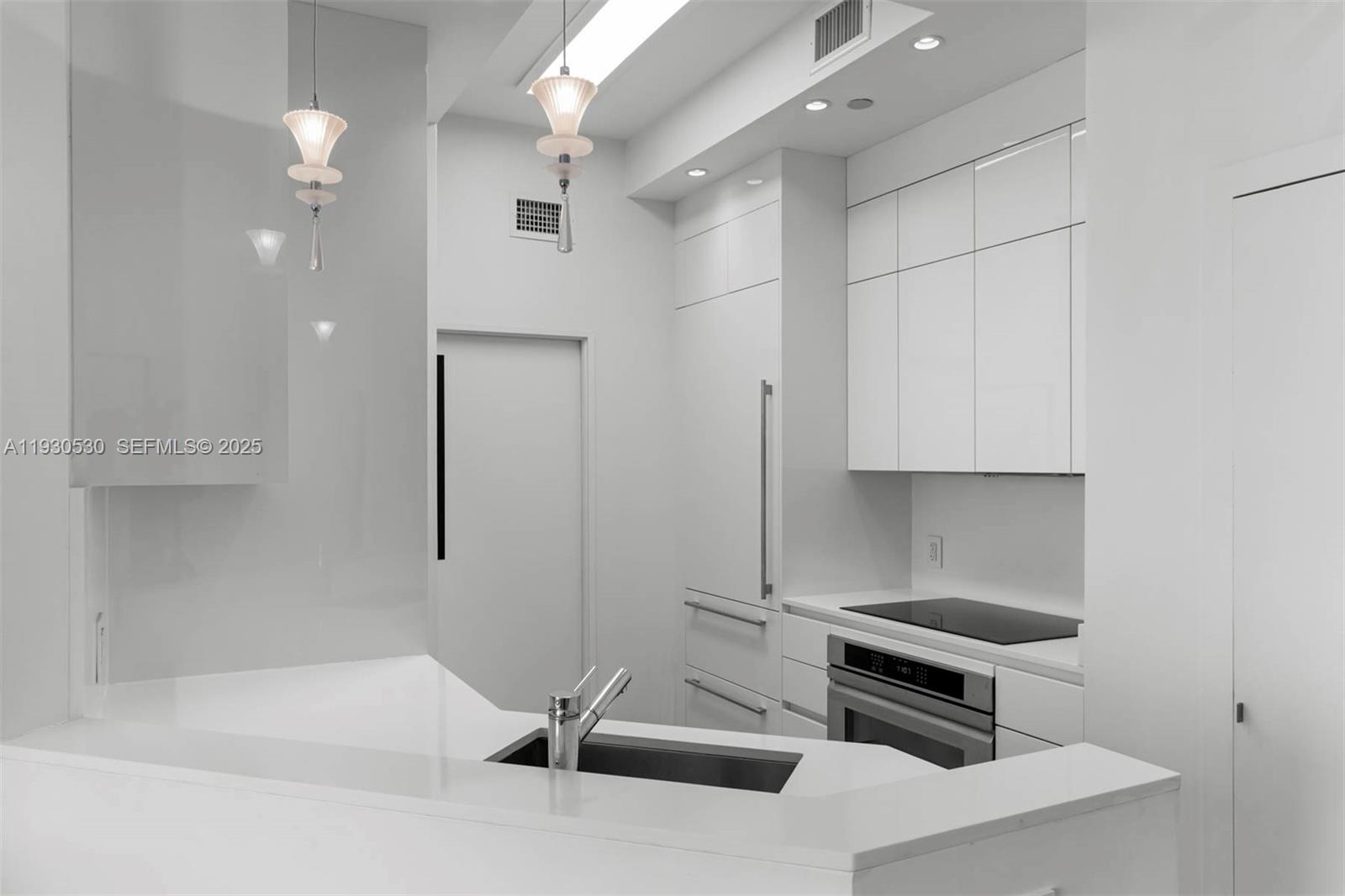 888 Brickell Key Drive, Unit 2606 Miami, FL 33131 - Photo 7 of 32 a bathroom with a bathtub and shower