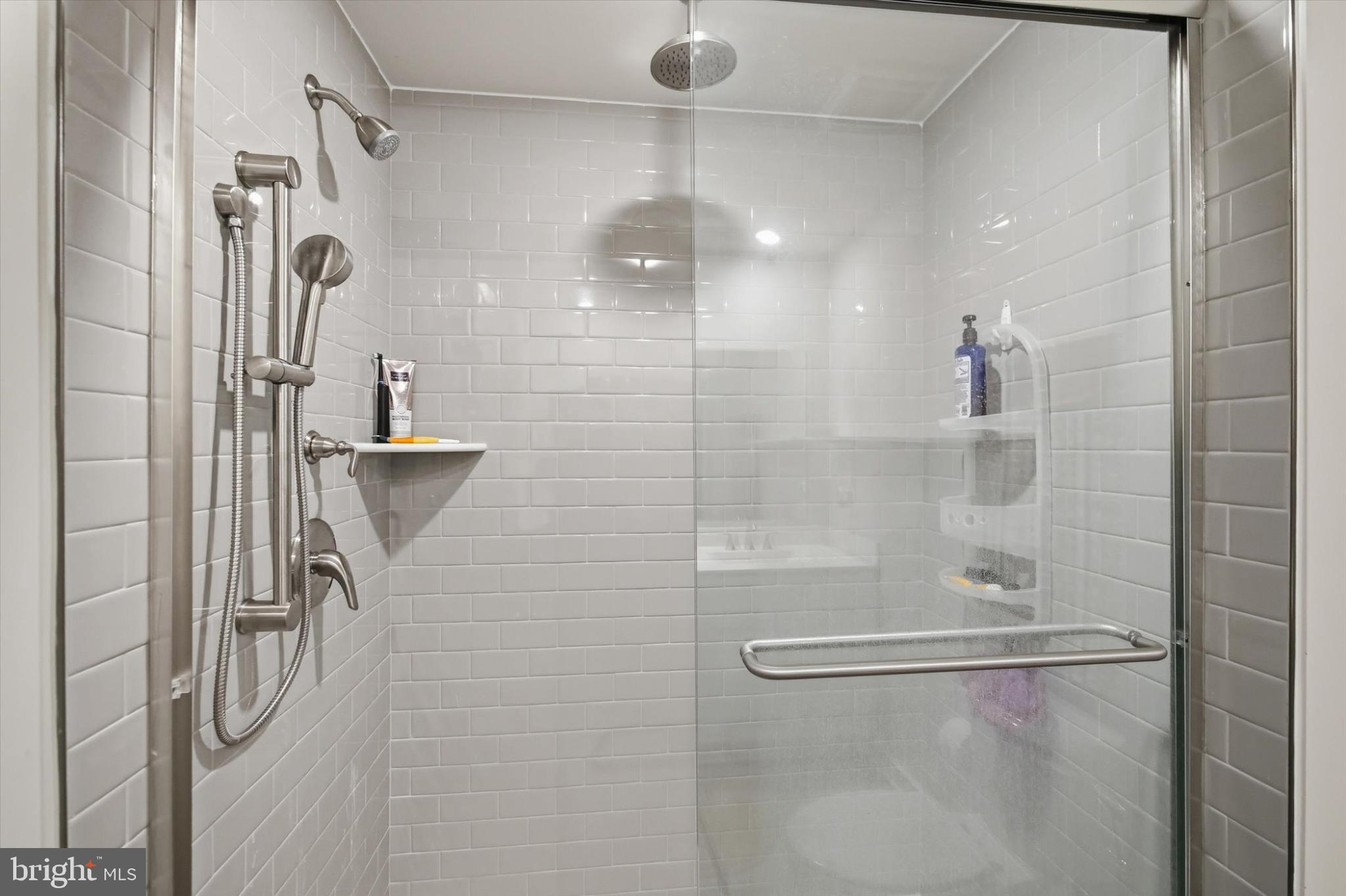 150 Ramshorn Road Inwood, WV 25428 - Photo 16 of 20 Sleek modern shower with elegant tiles.