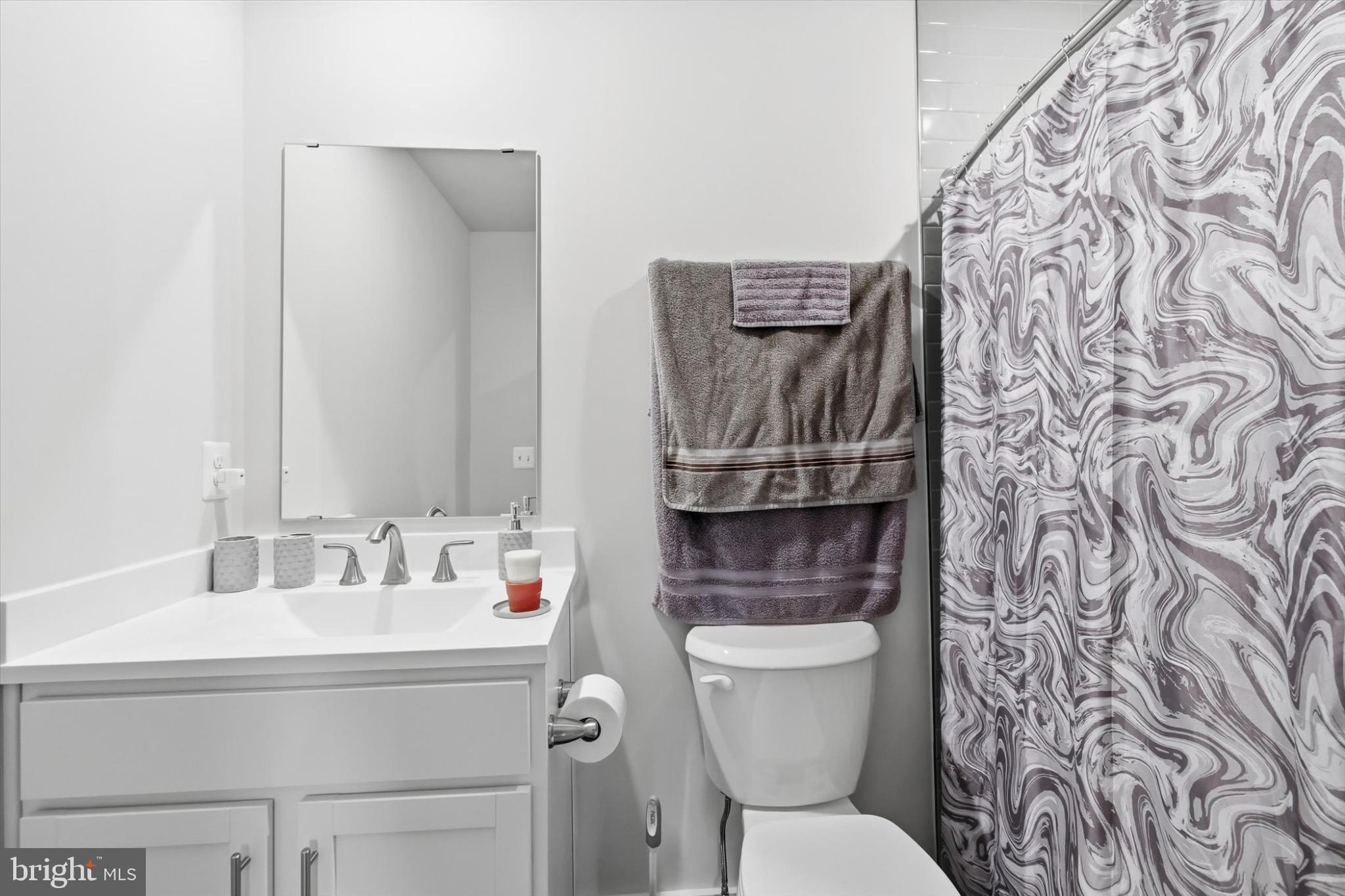 150 Ramshorn Road Inwood, WV 25428 - Photo 10 of 20 Modern bathroom with elegant marble accents.