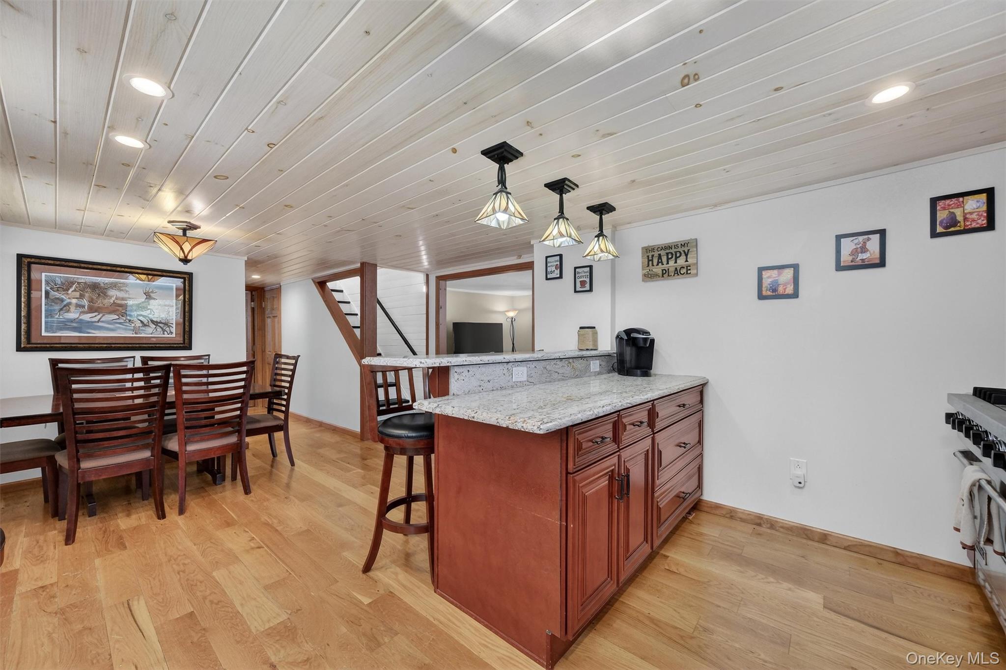 50 Tempaloni Road Ellenville, NY 12428 - Photo 13 of 46 a kitchen with a stove a refrigerator and a dining table