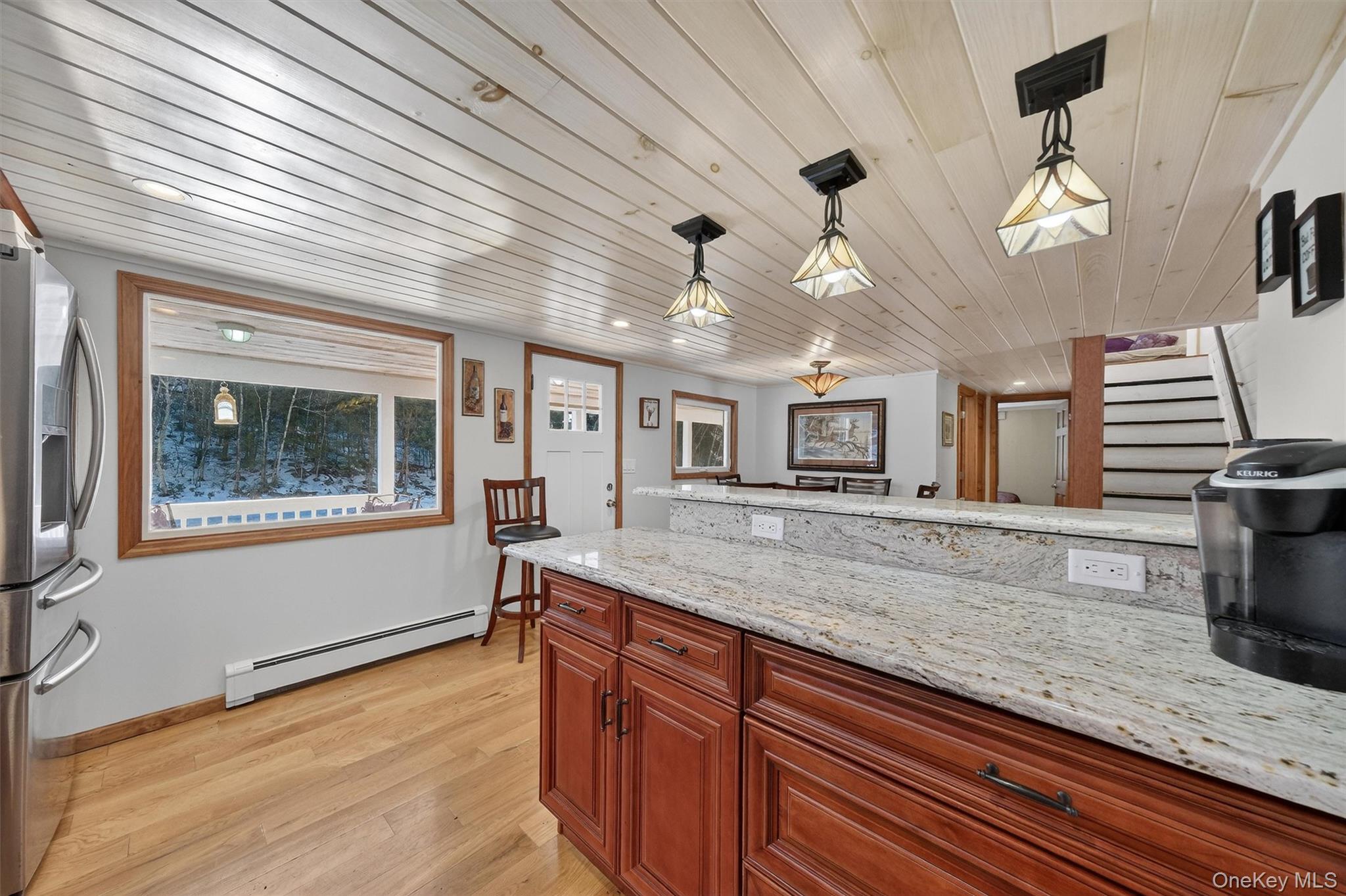 50 Tempaloni Road Ellenville, NY 12428 - Photo 15 of 46 a view of a kitchen with a sink and wooden floor