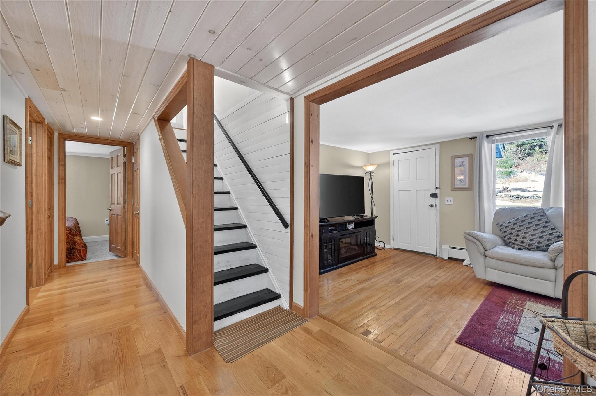 50 Tempaloni Road Ellenville, NY 12428 - Photo 17 of 46 a view of a livingroom with furniture and staircase