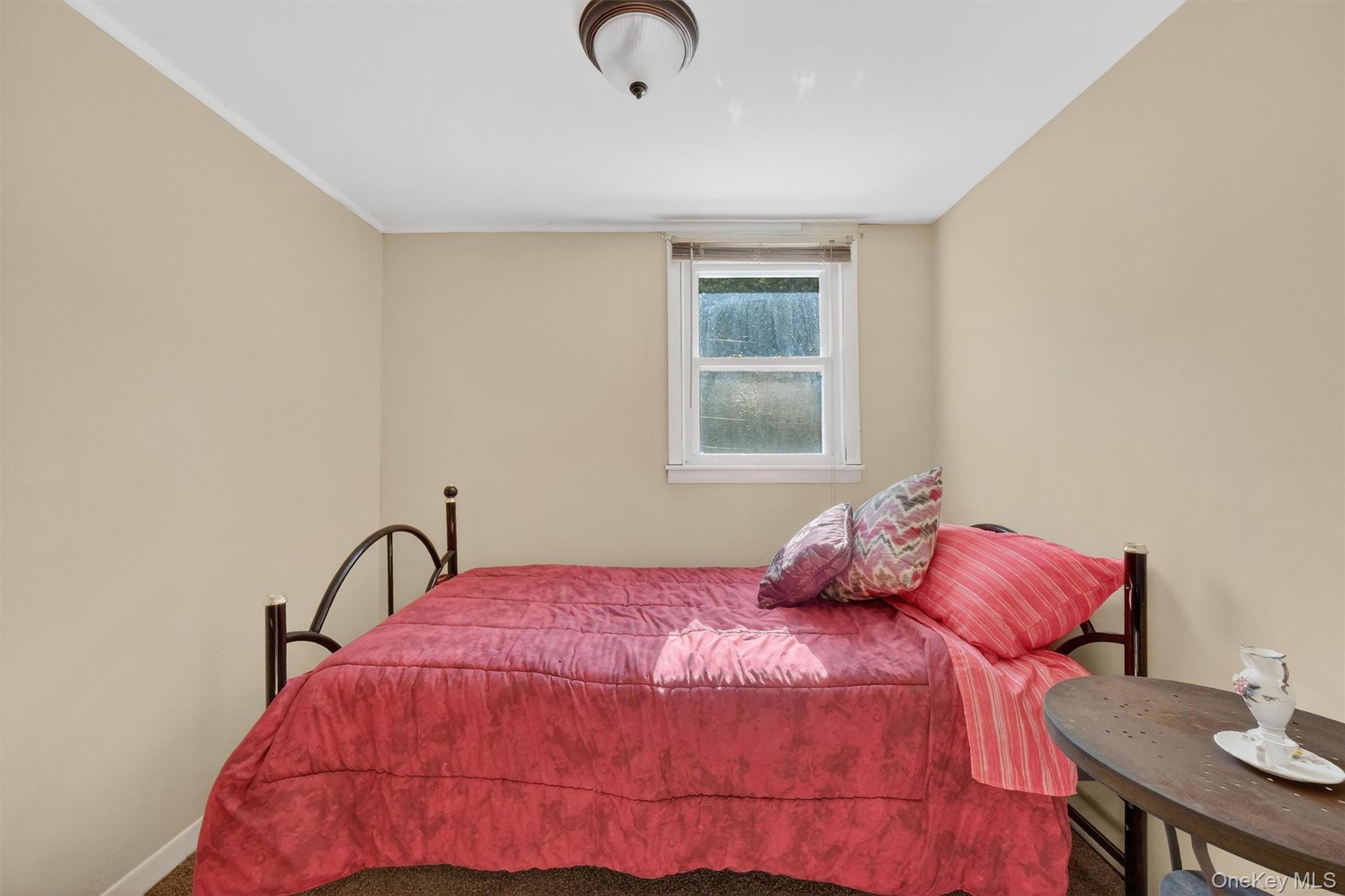 50 Tempaloni Road Ellenville, NY 12428 - Photo 28 of 46 a bedroom with a bed and a window