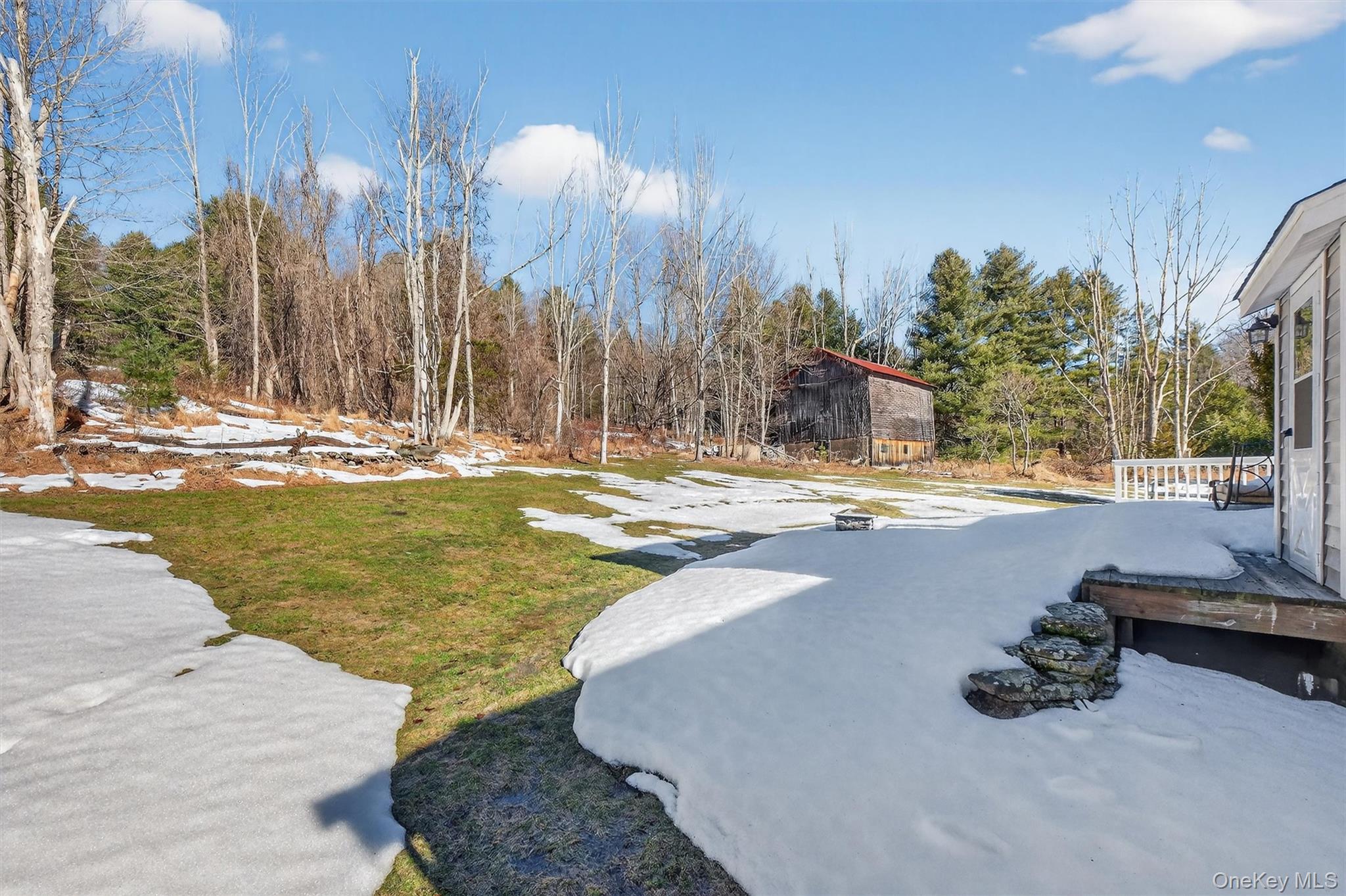 50 Tempaloni Road Ellenville, NY 12428 - Photo 31 of 46 a view of a swimming pool with an outdoor space and seating area