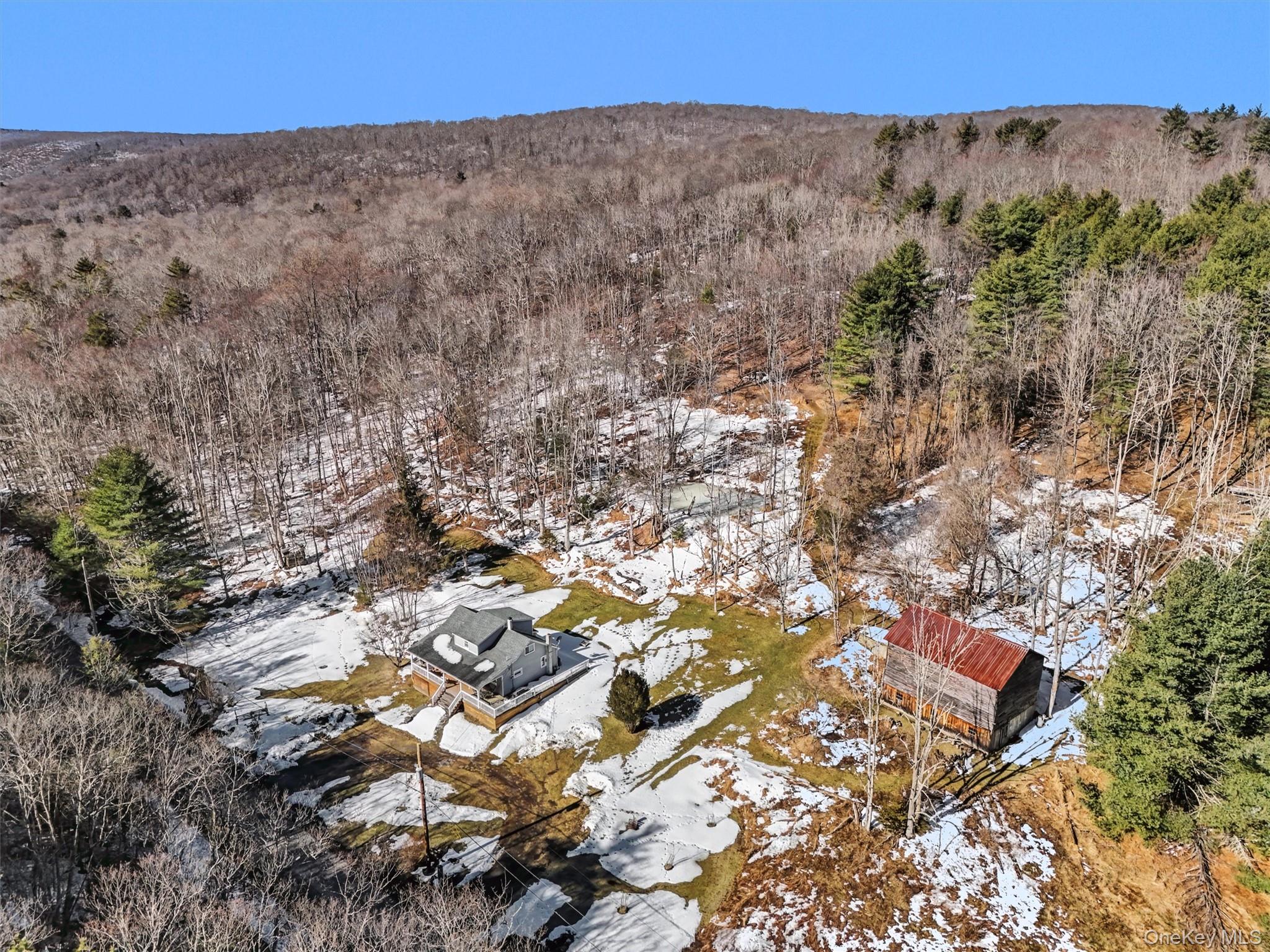 50 Tempaloni Road Ellenville, NY 12428 - Photo 8 of 46 an aerial view of a house with a street