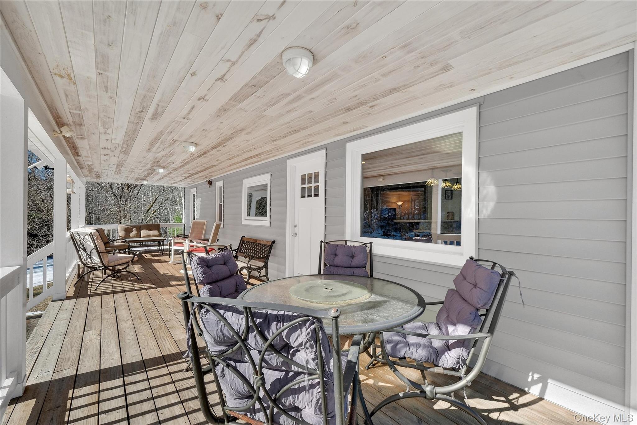 50 Tempaloni Road Ellenville, NY 12428 - Photo 10 of 46 a view of a dining room with furniture window and outside view