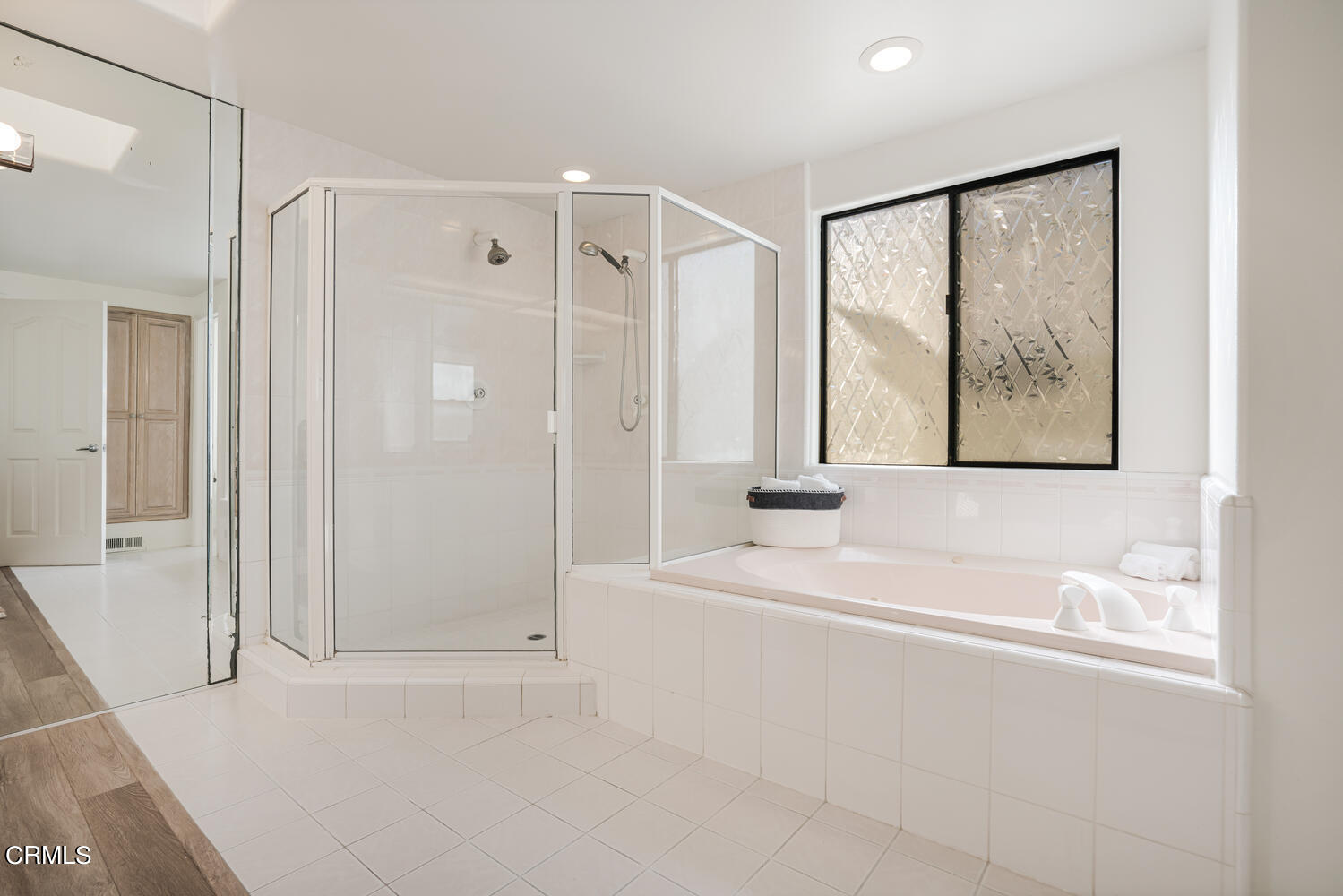 312 Melrose Drive Oxnard, CA 93035 - Photo 26 of 58 a bathroom with a bathtub and a shower