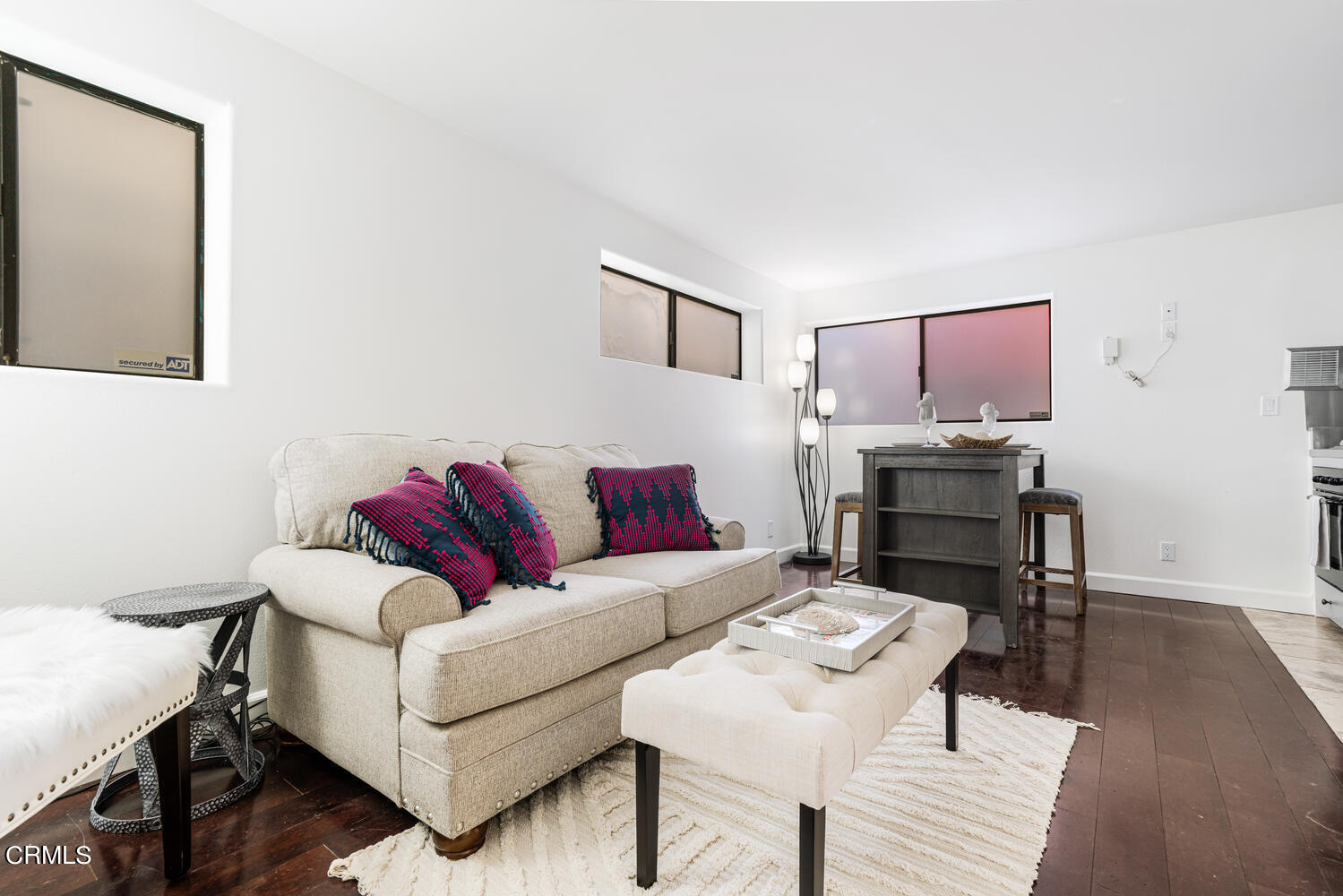 312 Melrose Drive Oxnard, CA 93035 - Photo 31 of 58 a living room with furniture and a wooden floor