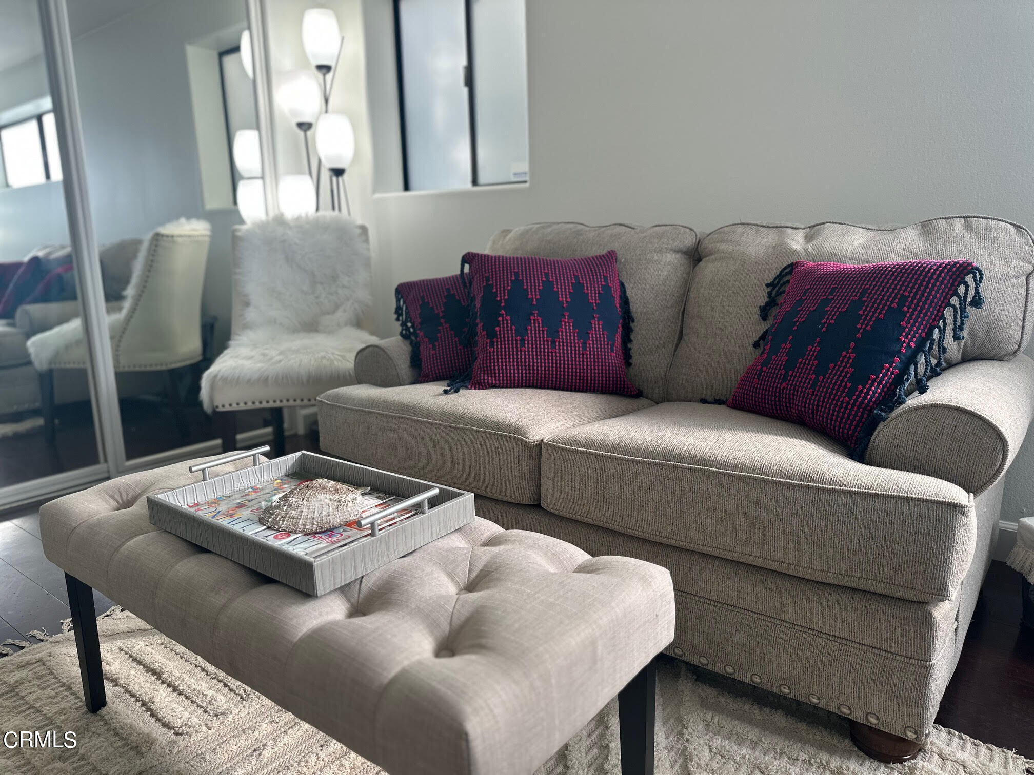 312 Melrose Drive Oxnard, CA 93035 - Photo 35 of 58 a living room with furniture and a mirror