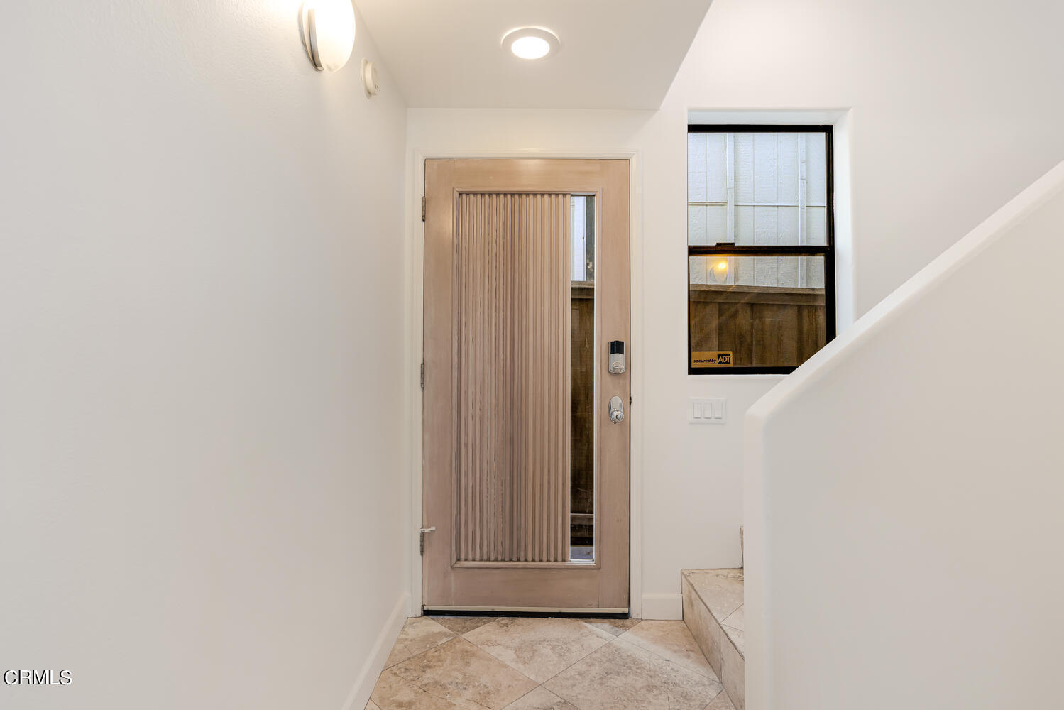 312 Melrose Drive Oxnard, CA 93035 - Photo 6 of 58 a view of a hallway with wooden floor and entryway