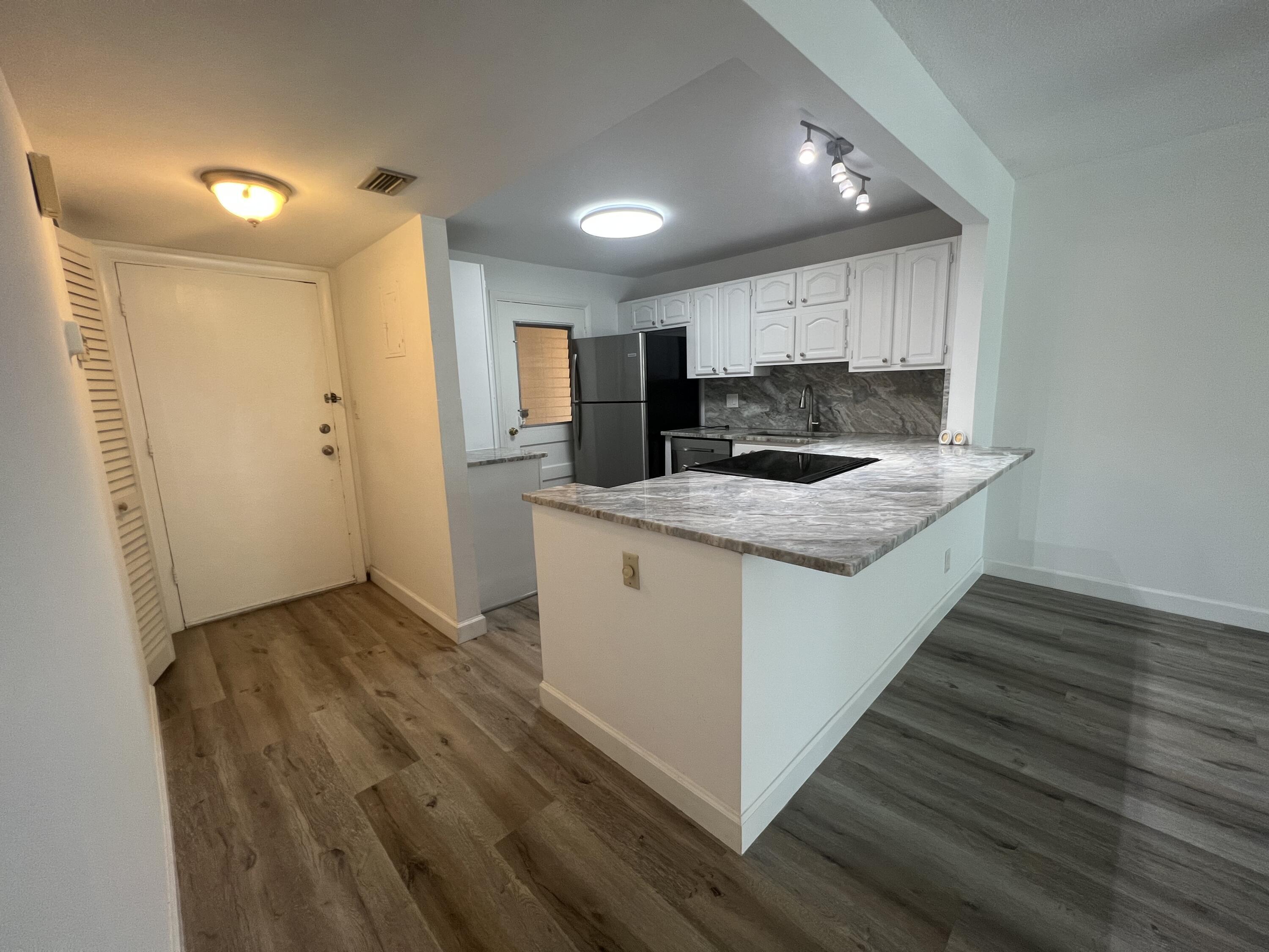 6161 Northwest 2nd Avenue, Unit 114 Boca Raton, FL 33487 - Photo 12 of 23 Kitchen/Dining