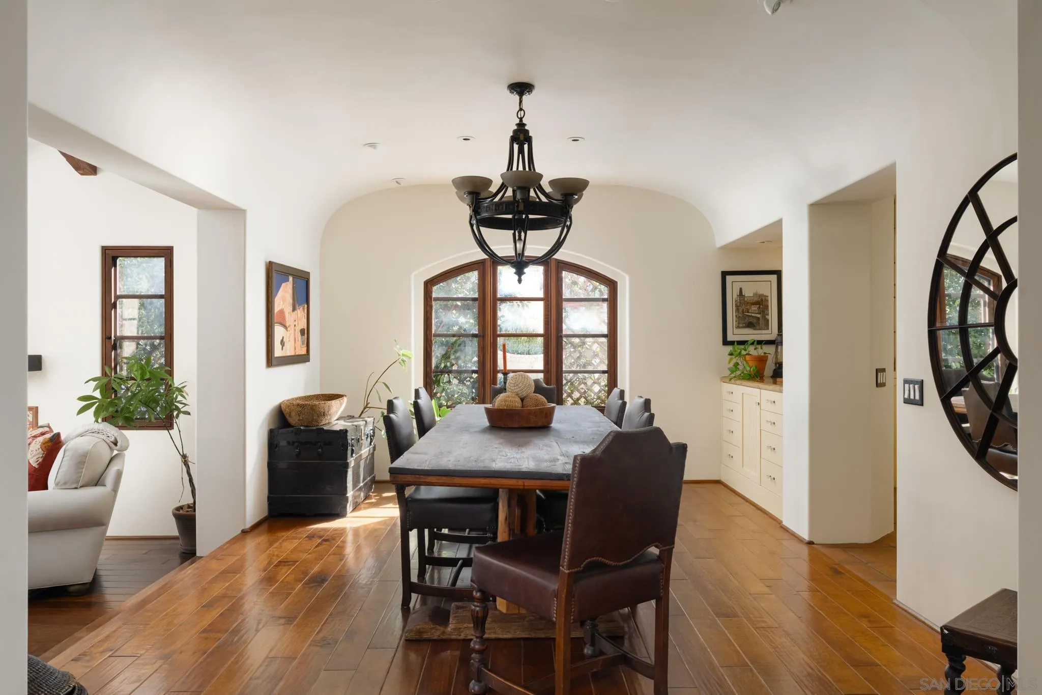 2563 Via Pisa Del Mar, CA 92014 - Photo 16 of 50 a view of a dining room with furniture window and wooden floor