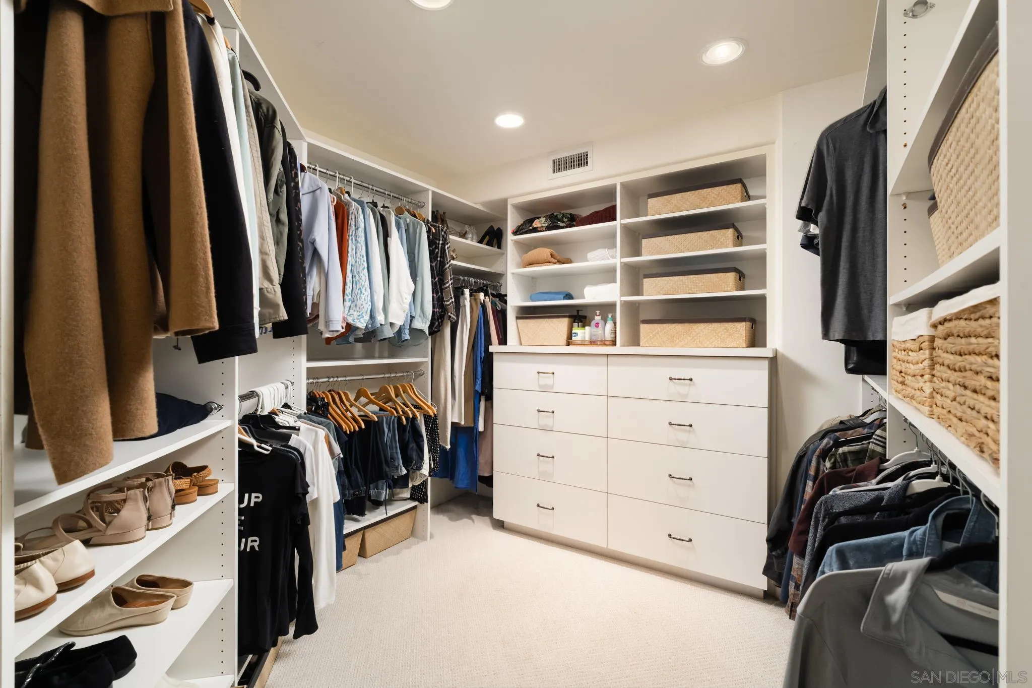 2563 Via Pisa Del Mar, CA 92014 - Photo 24 of 50 walk in closet with clothes and shoes