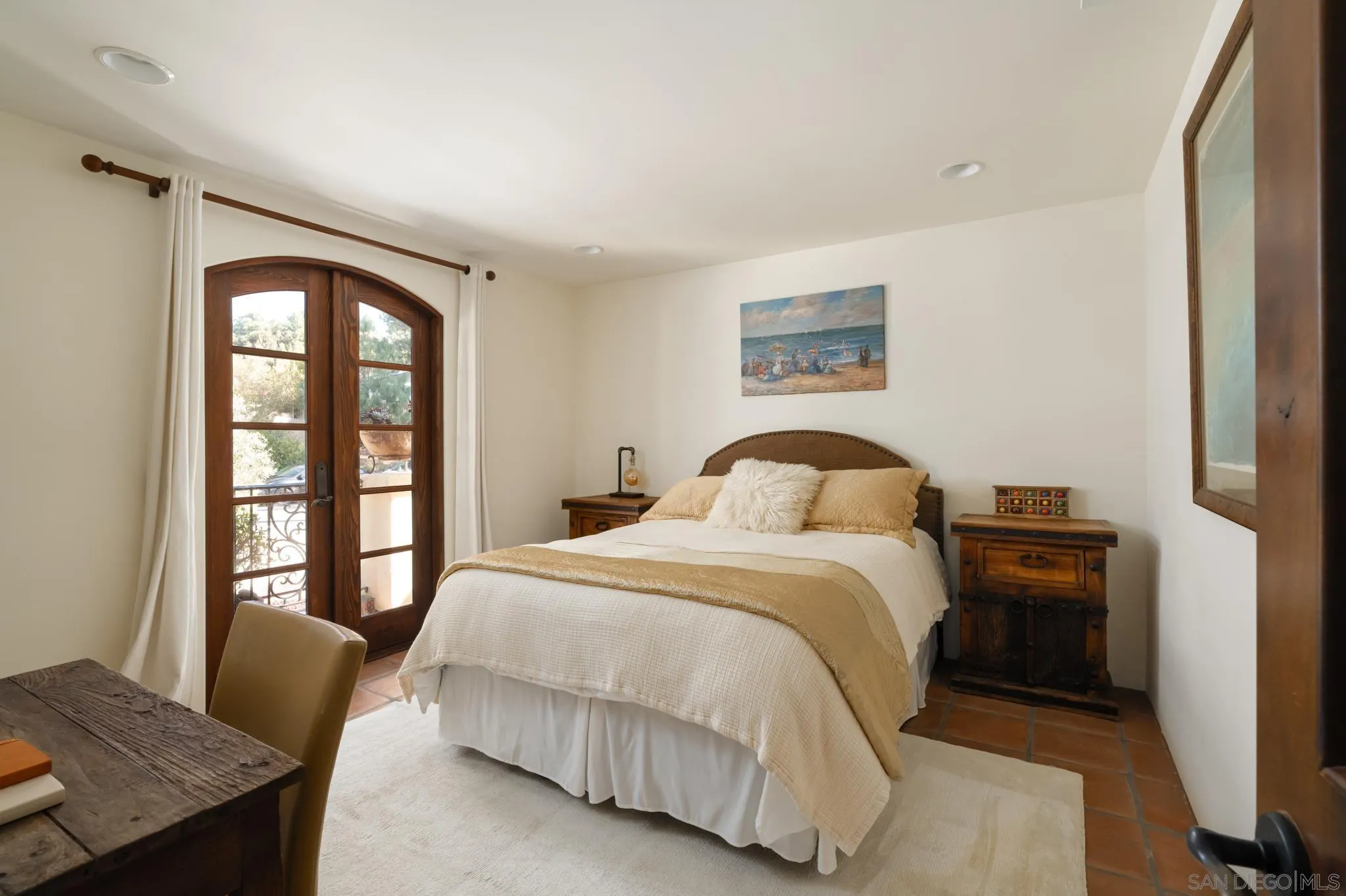 2563 Via Pisa Del Mar, CA 92014 - Photo 29 of 50 a bedroom with a bed and a window