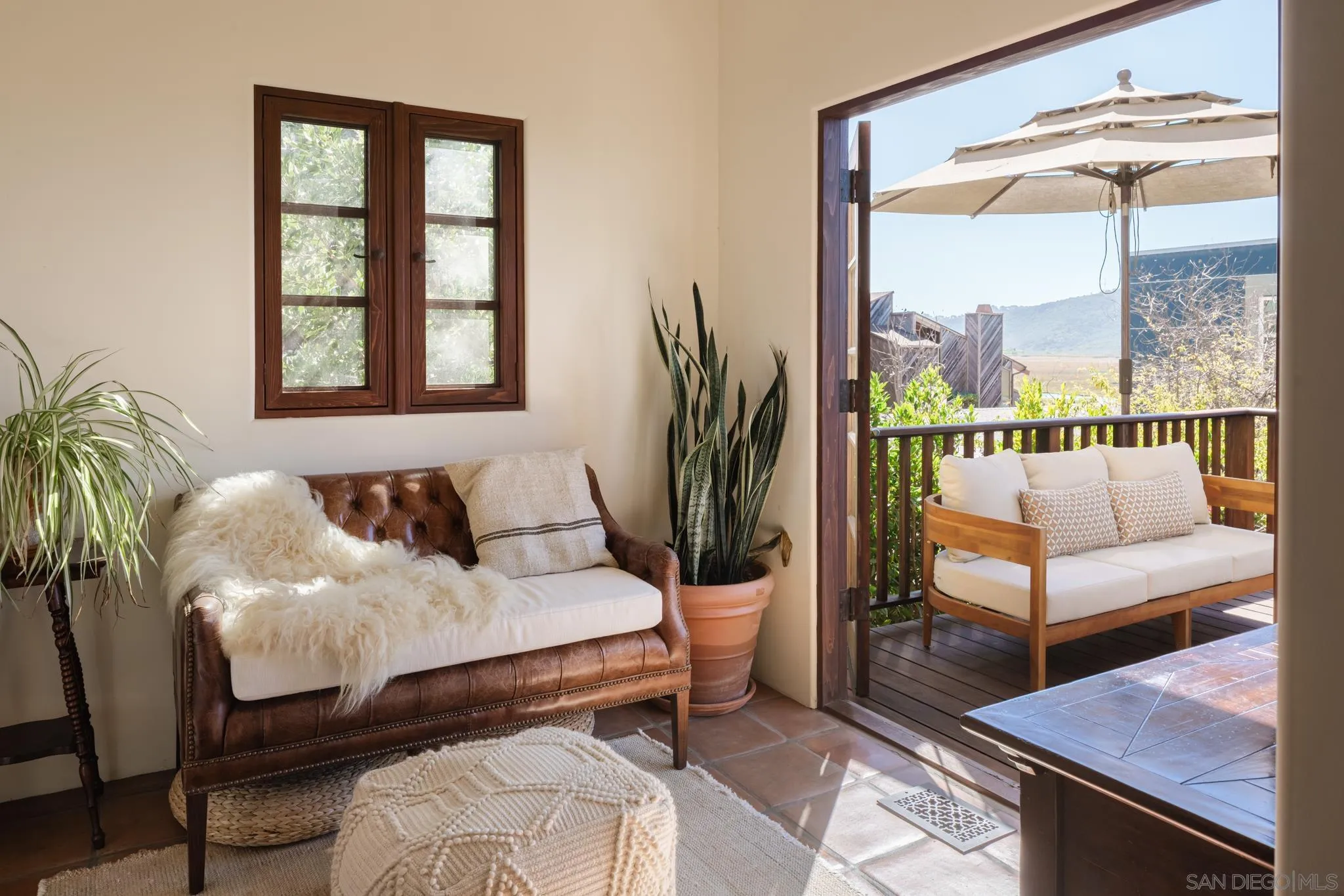 2563 Via Pisa Del Mar, CA 92014 - Photo 38 of 50 a living room with furniture and a window