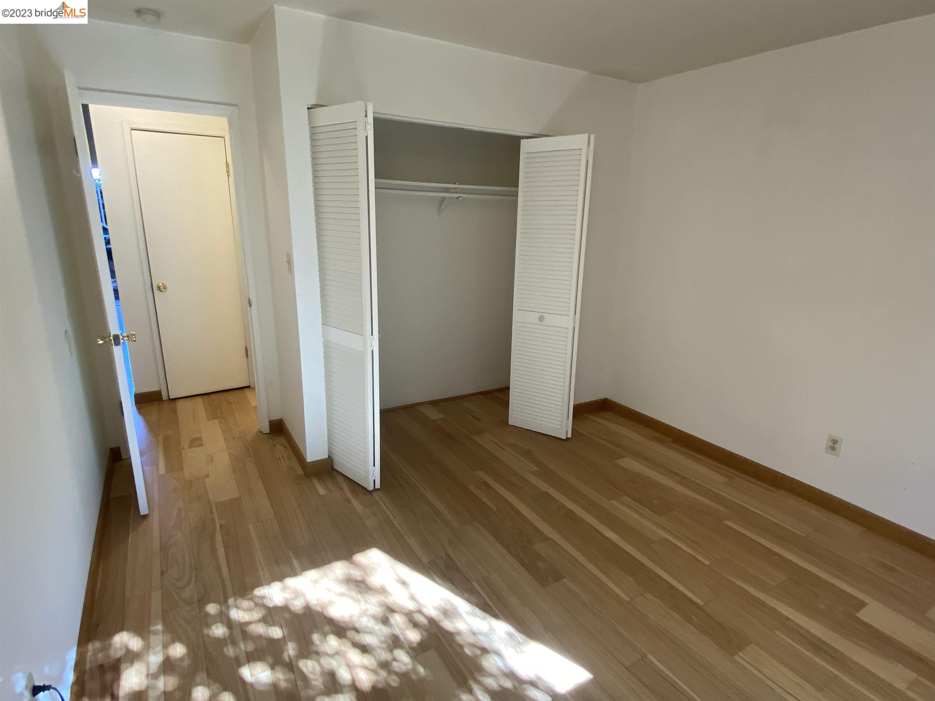 968 45th Street, Unit A Oakland, CA 94608 - Photo 12 of 16 a view of entryway with wooden floor