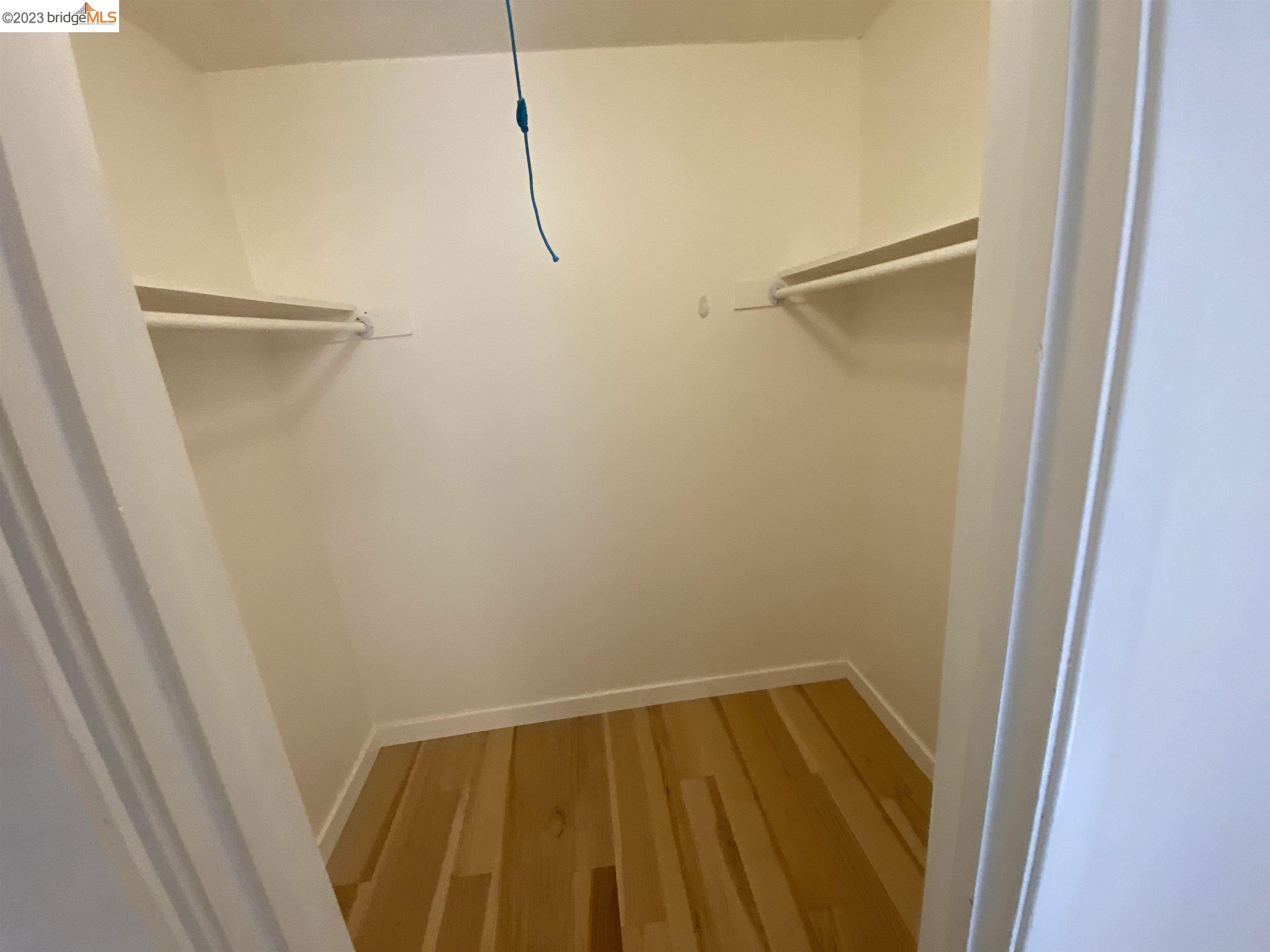 968 45th Street, Unit A Oakland, CA 94608 - Photo 16 of 16 a view of walk in closet with empty racks